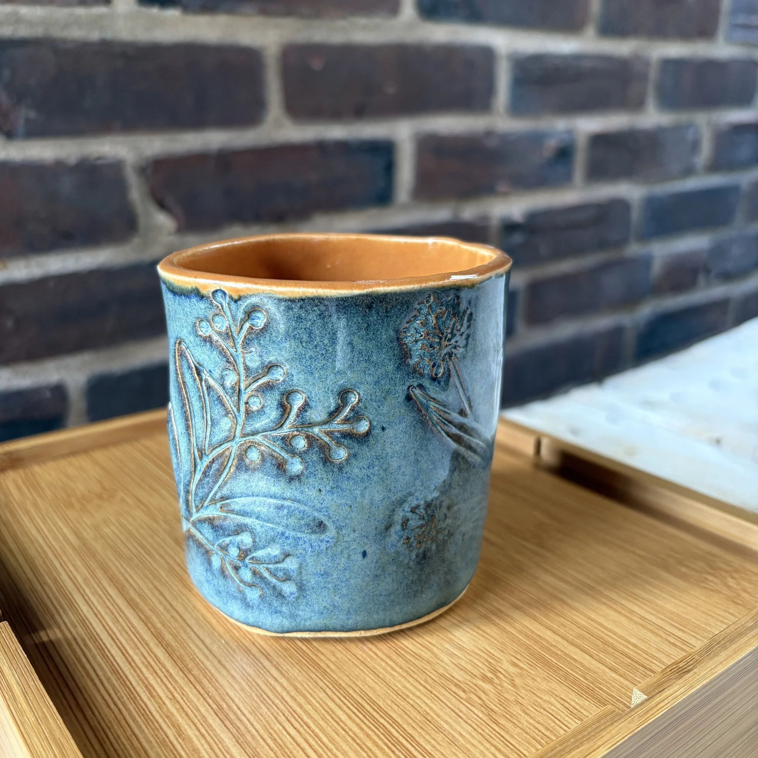 Floral floating blue tumbler