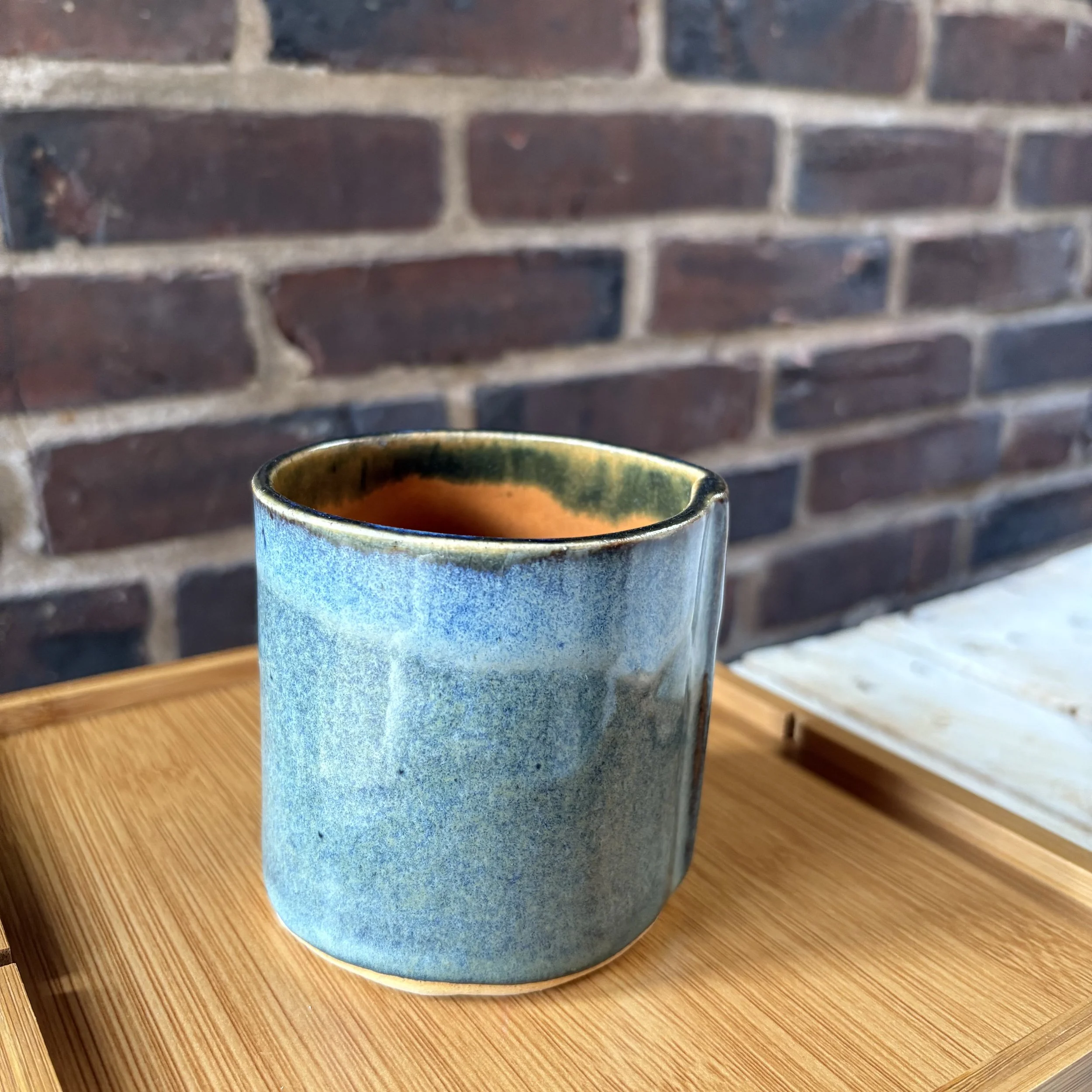 Floating blue tumbler