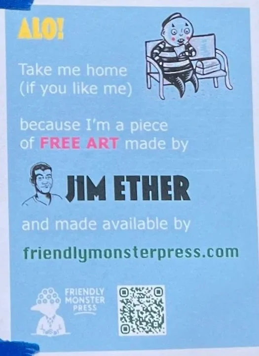 A blue flyer promoting free art by Jim Ether, available at friendlymonterpress.com, featuring a cartoon dog sitting on a bench, and a small illustration of a person with a dog head. Contains a QR code and the Friendly Monster Press logo.