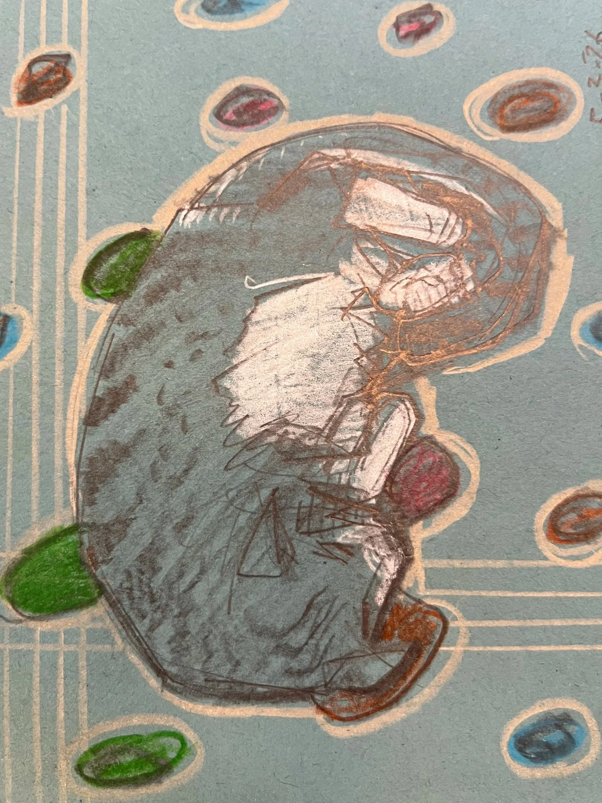 A hand-drawn illustration on paper with various colored elements, including a large green shape, a gray shape, and dotted outlines surrounding smaller circular elements in different colors. The drawing appears to be done with colored pencils or marke