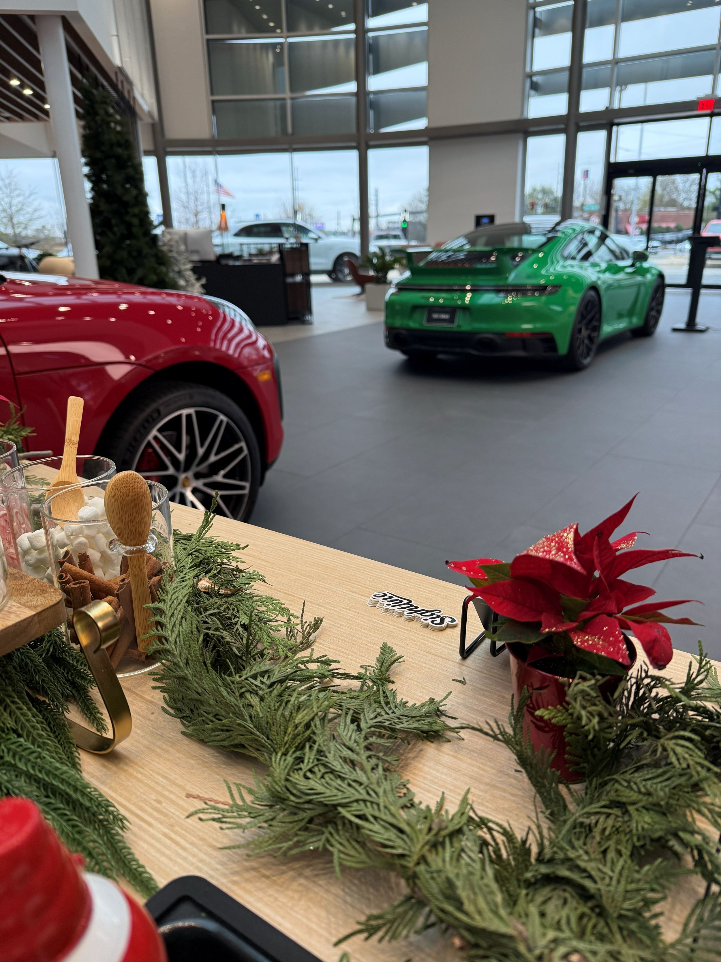 Guests enjoying specialty coffee from the Sightline Coffee mobile espresso bar during a Porsche corporate event in Atlanta, Georgia.