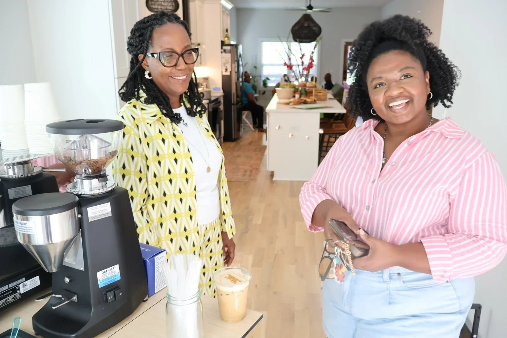  Housewarming guests gathered around a coffee cart in Columbus, Georgia 