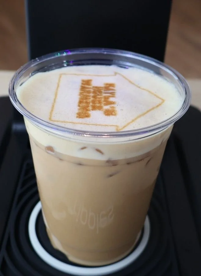  Guests enjoying handcrafted coffee drinks during a housewarming celebration in Columbus Georgia 