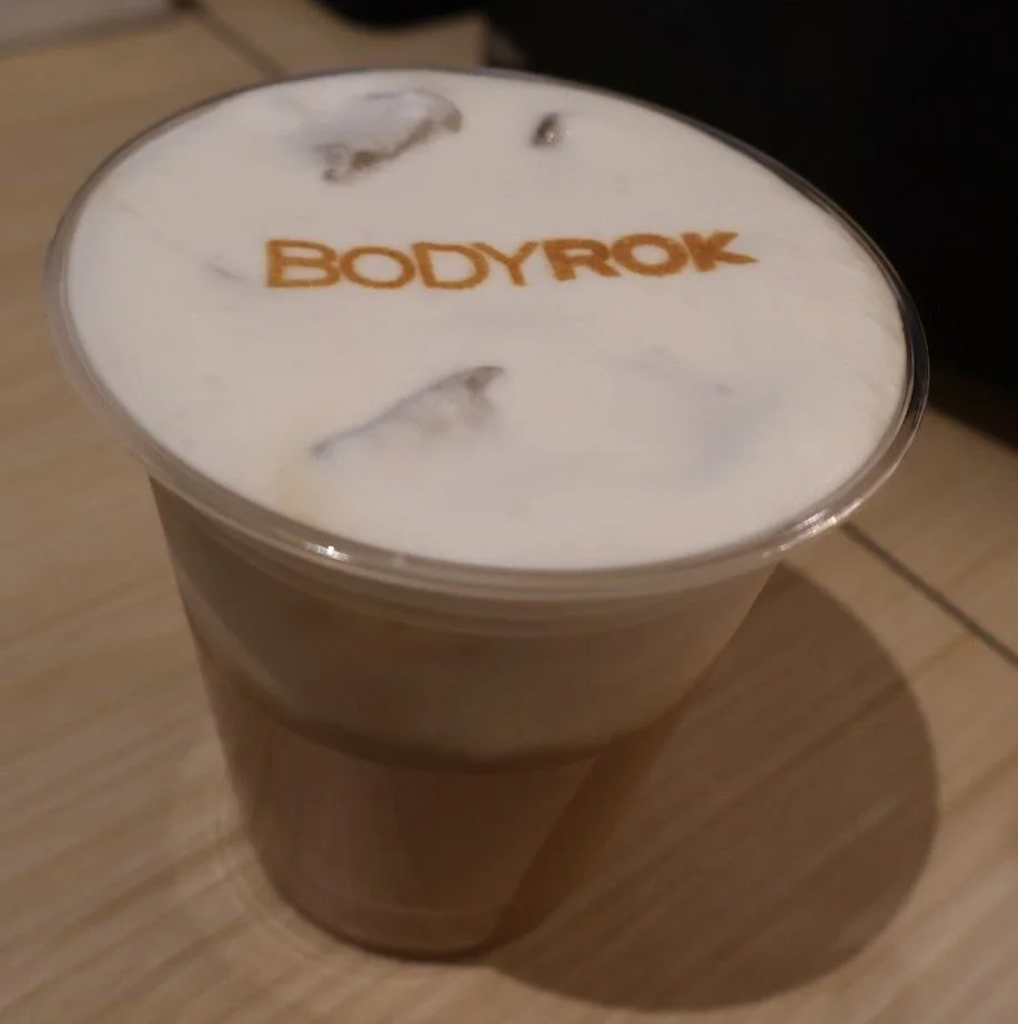  Atlanta coffee catering company serving specialty drinks at a Pilates studio event 