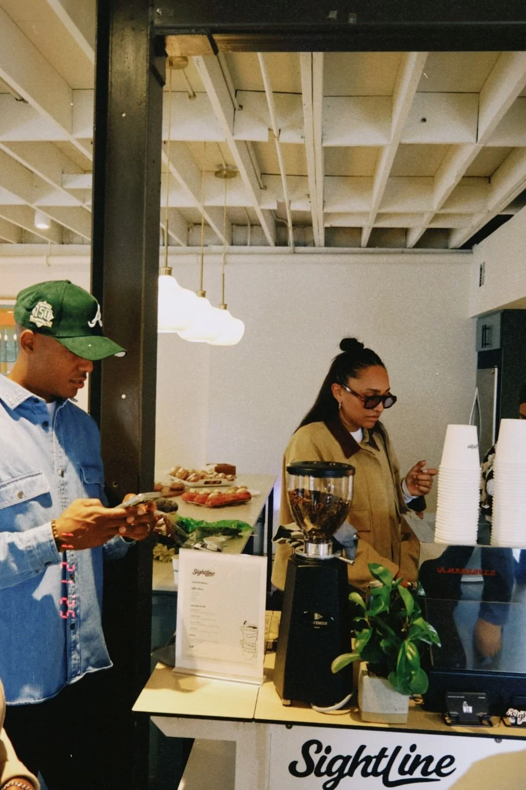Custom coffee cart serving specialty drinks at the Sightline Coffee launch party