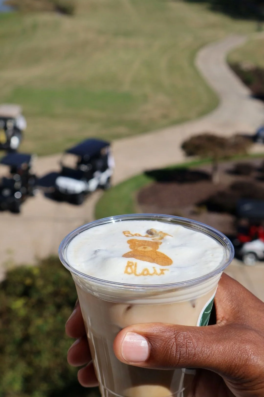 Close-up of handcrafted latte art prepared by a barista for a baby shower