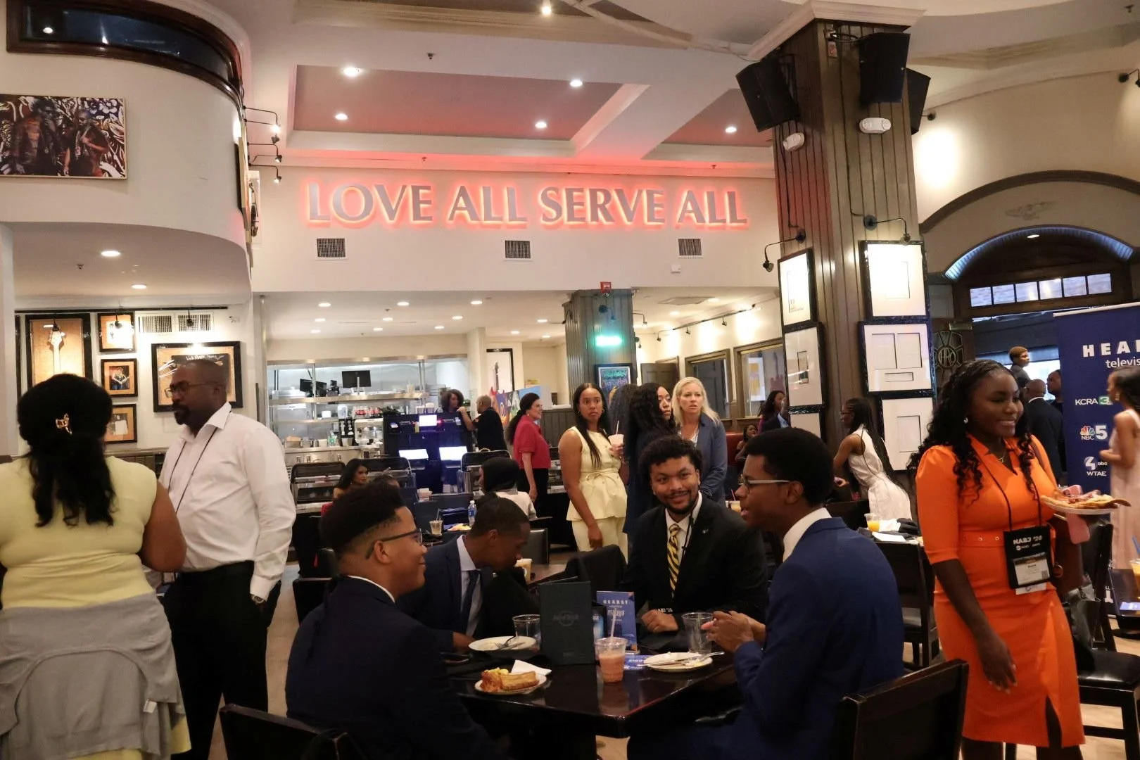 Wide shot of the coffee cart line during Hearst Television's NABJ26 breakfast