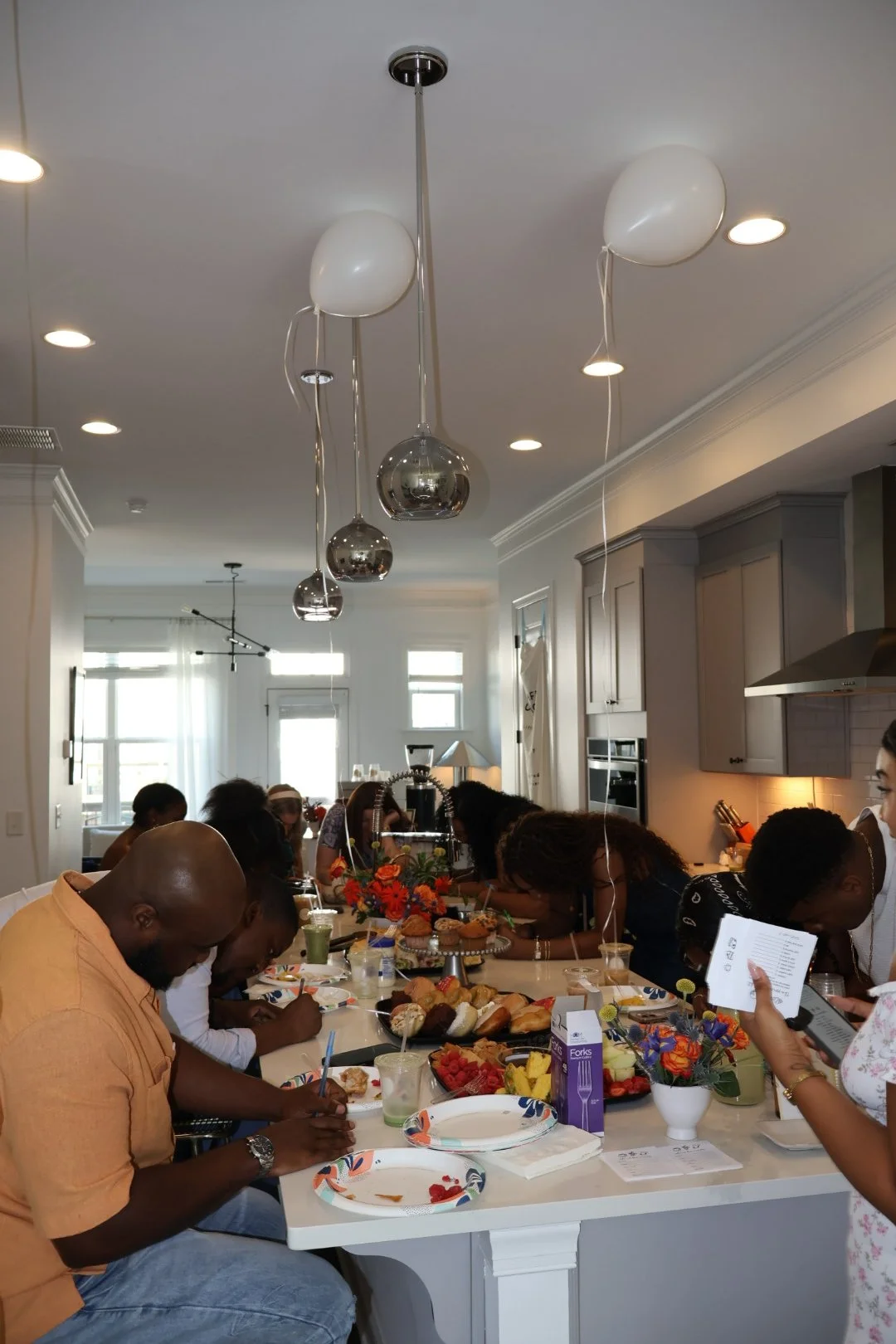 Baby shower guests enjoying a private celebration with specialty coffee catering in Columbus, Georgia.