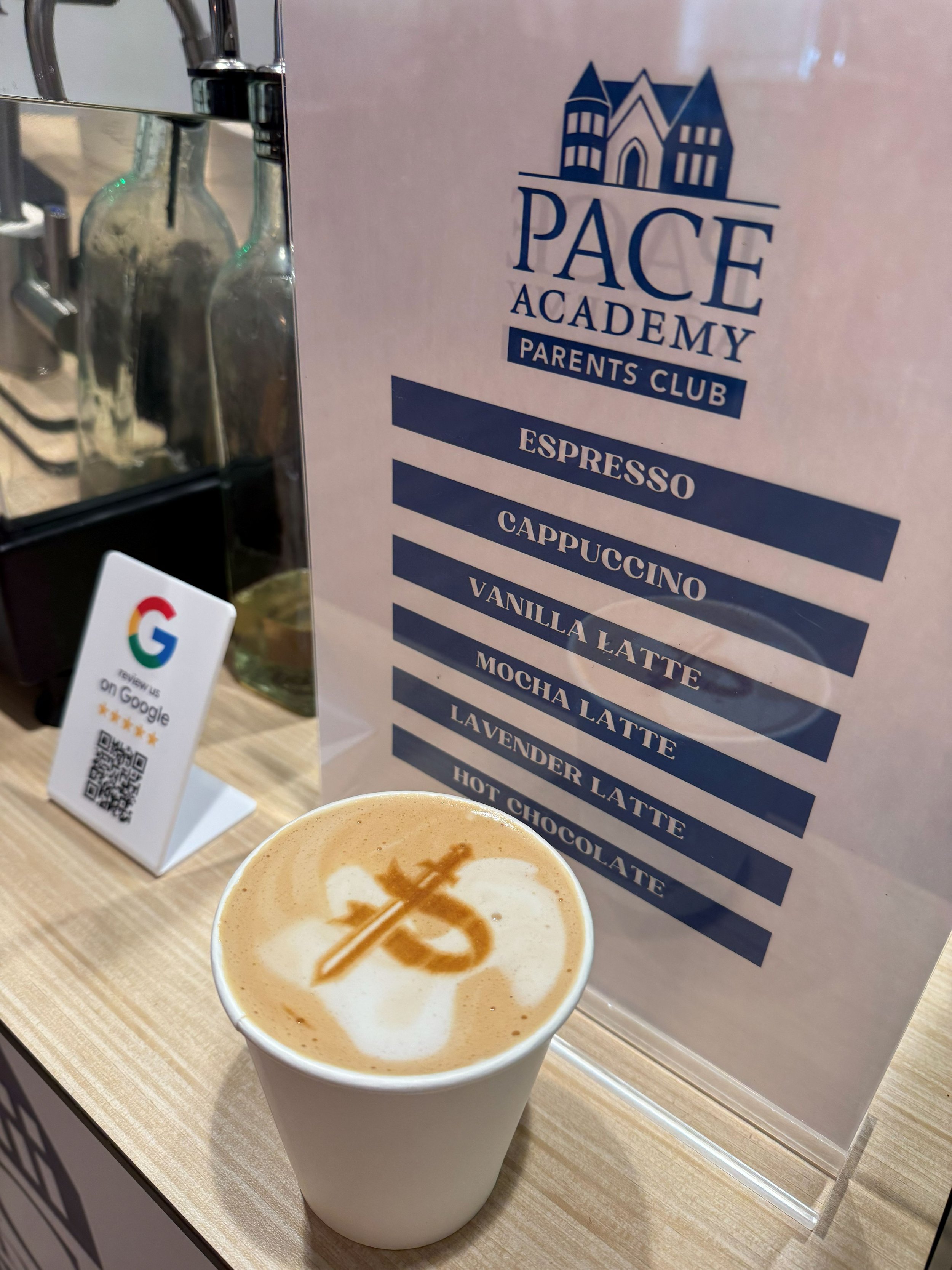 Custom latte printer stamping school logo — Atlanta coffee catering service