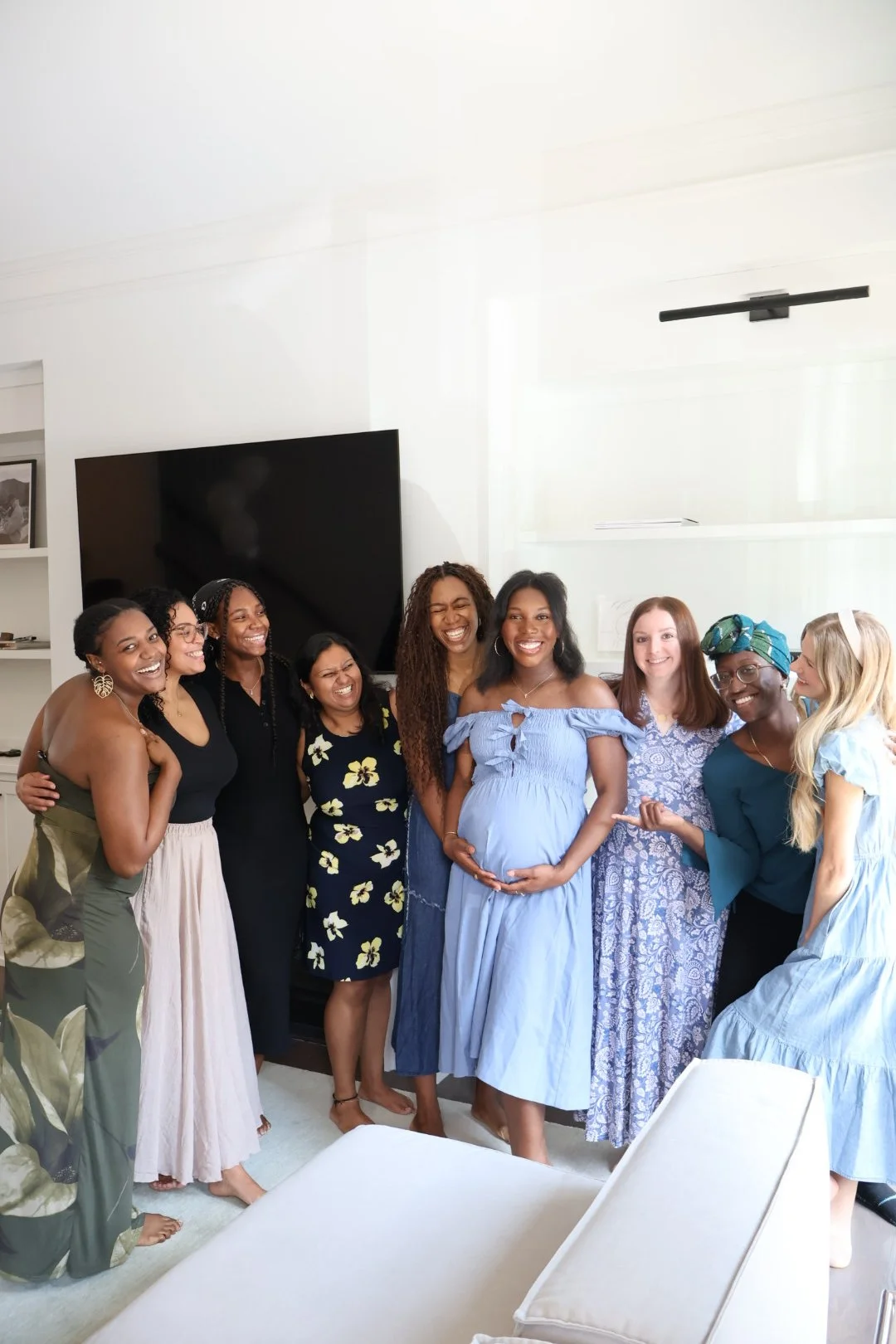 Friends celebrating a baby shower with custom coffee catering in Columbus, Georgia.