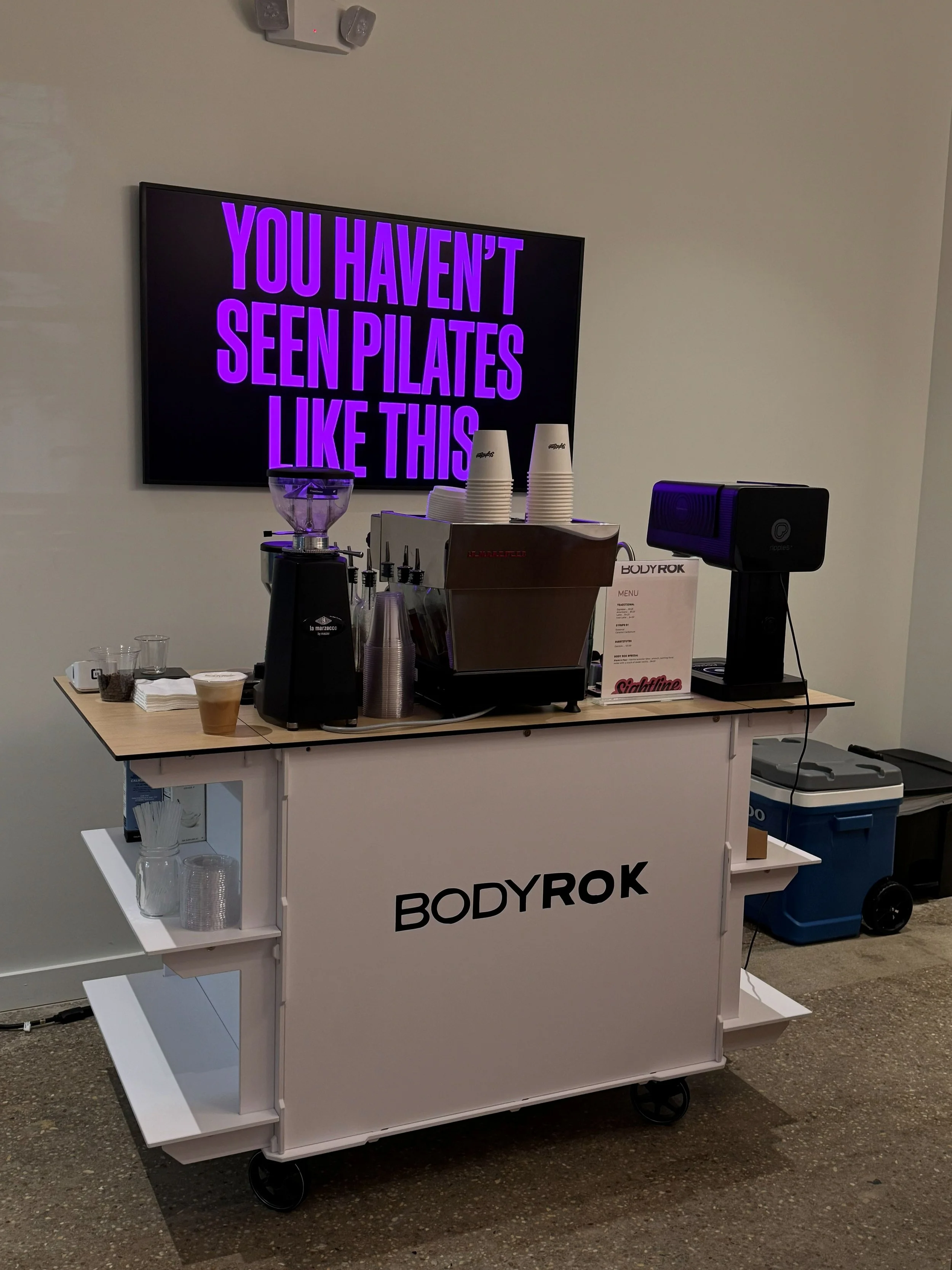 Coffee cart Atlanta serving Pilates clients during a wellness event in Inman Park