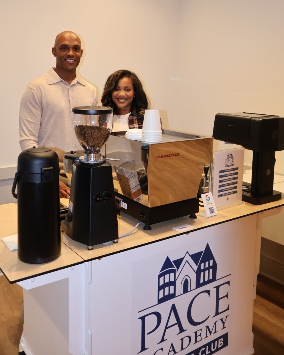 Barista serving teachers in line at Atlanta mobile coffee catering cart