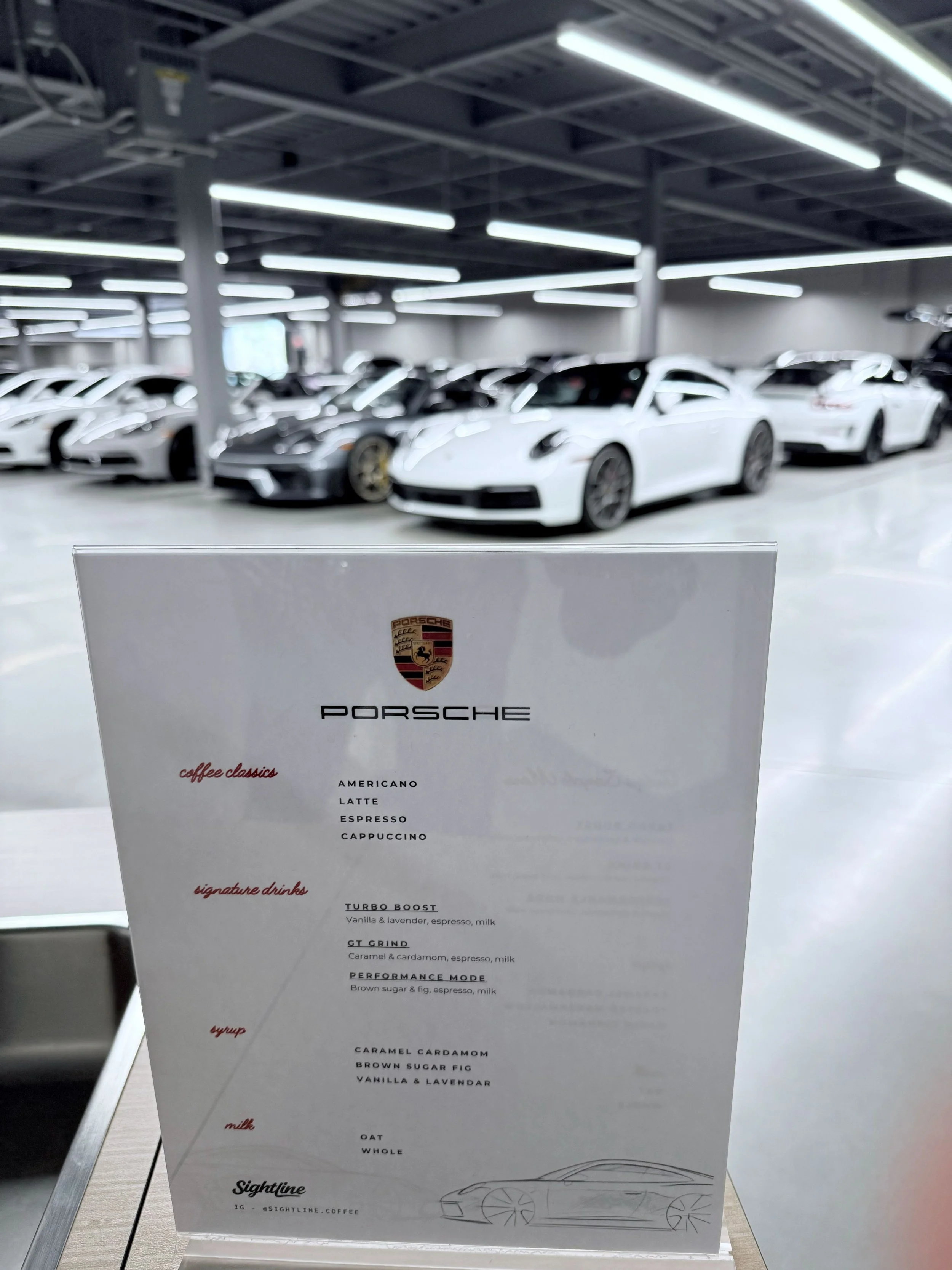 Porsche branded mobile coffee cart set up for an Atlanta customer event