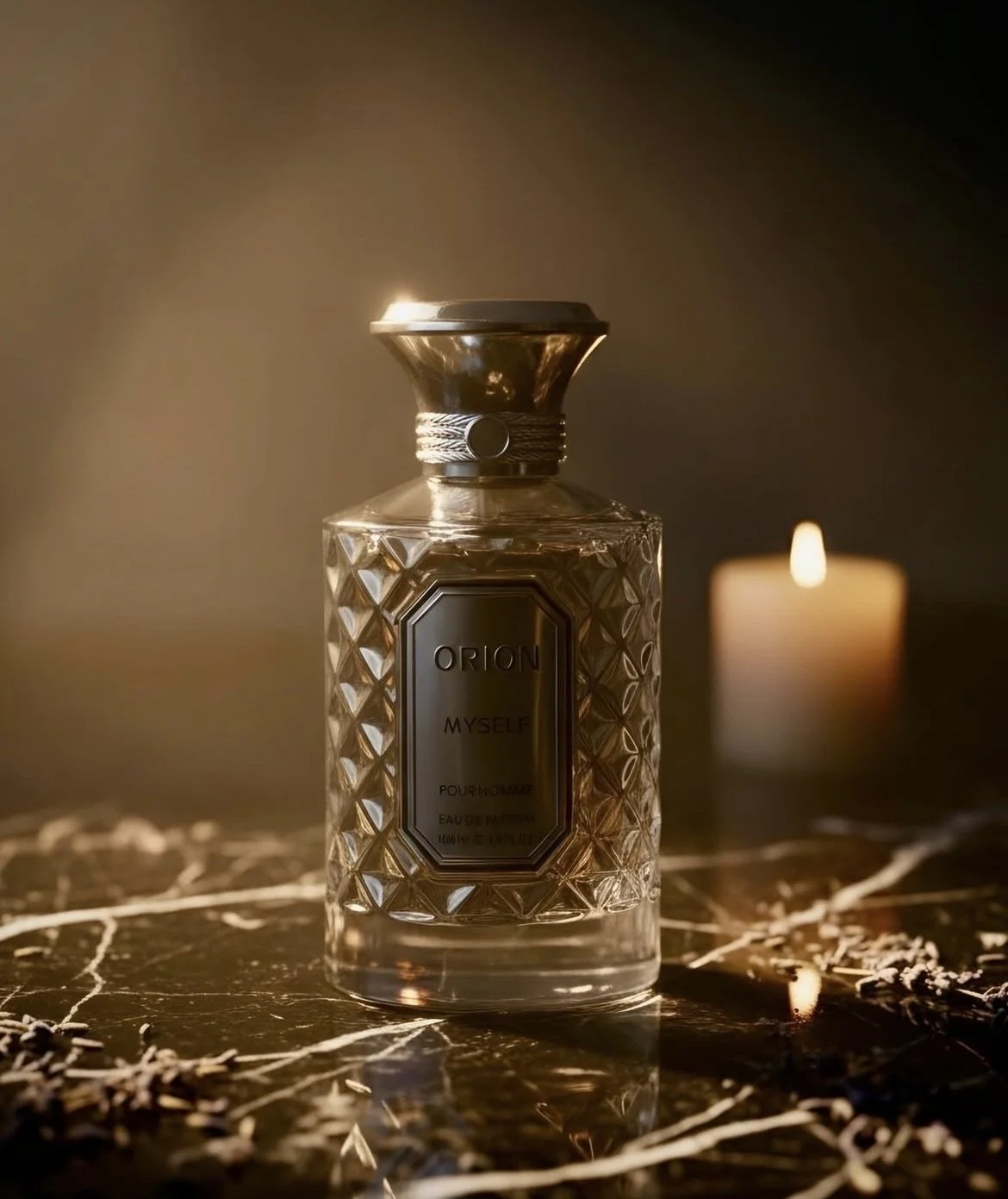 A glass perfume bottle labeled 'ORION MYSELF' on a dark surface with a lit candle in the background.
