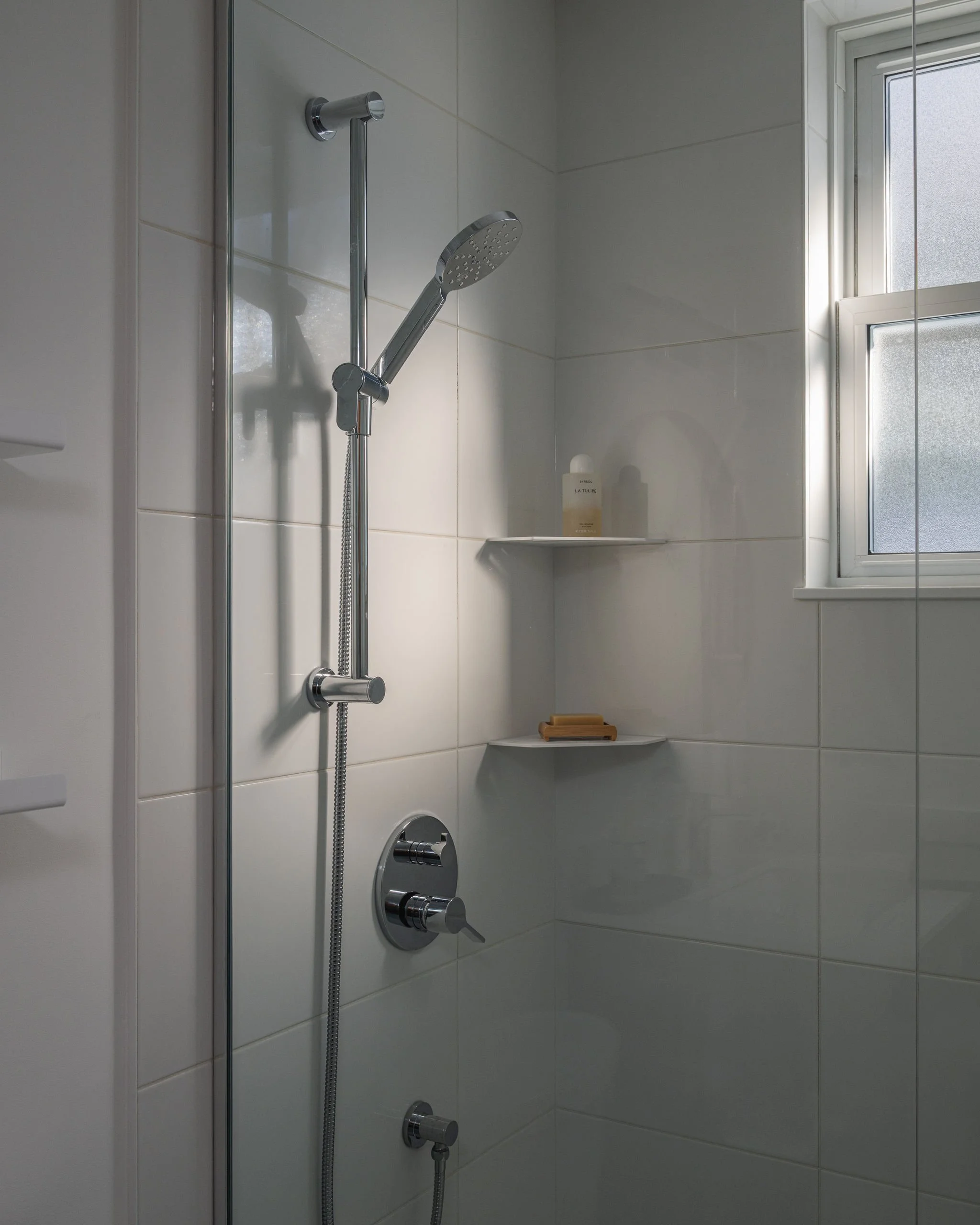 Bright Basement Bathroom w Window_2026_1.jpg