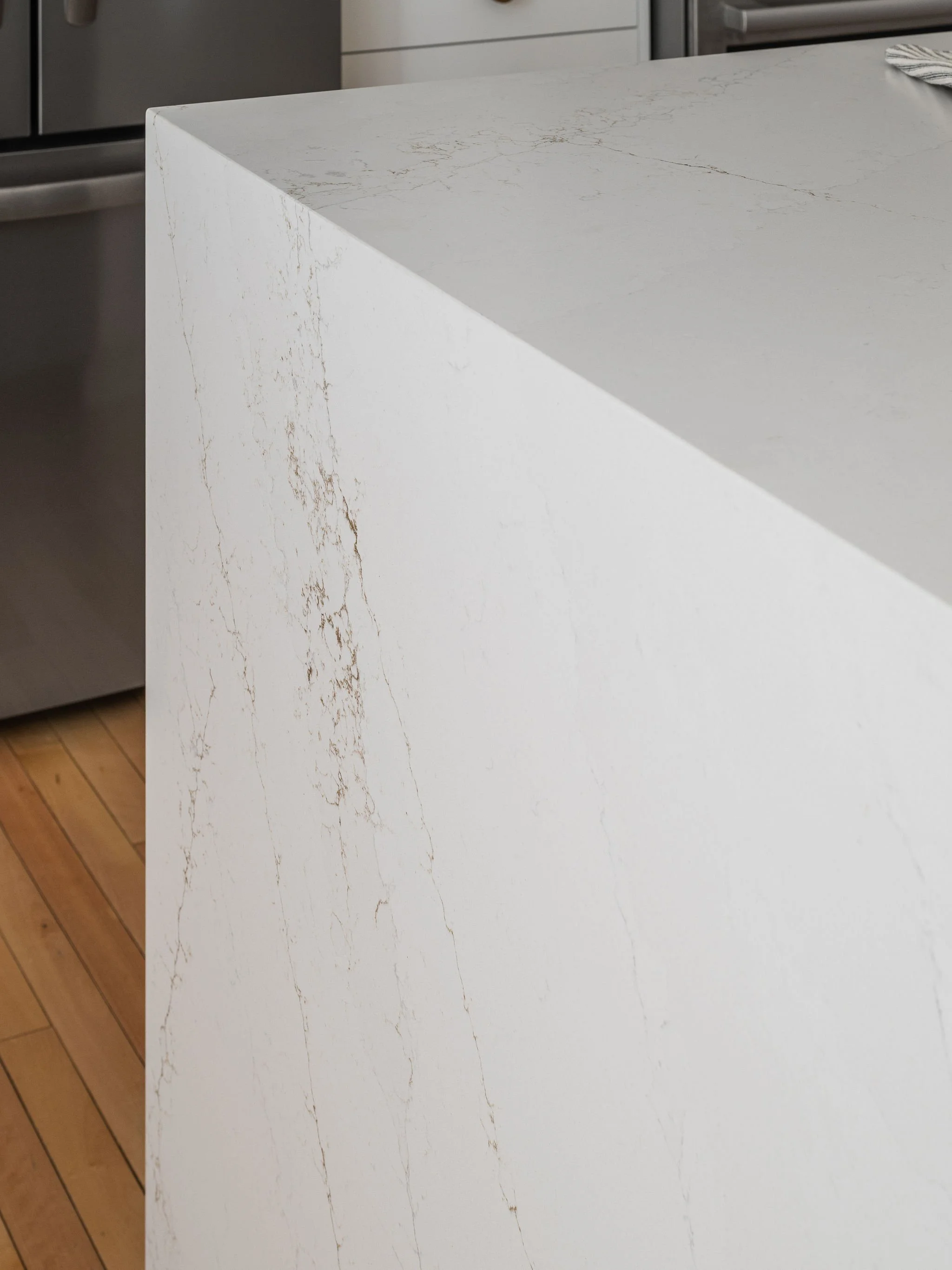 White waterfall edge countertop