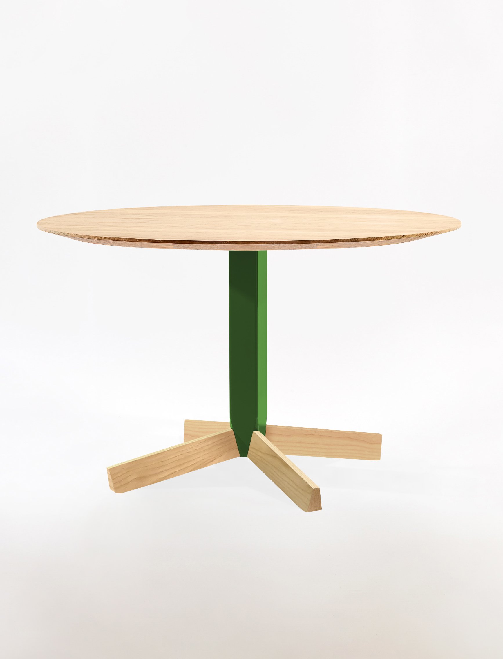 Peggy Table featuring a rounded tabletop set on a faceted central base, highlighting its balanced proportions, customizable materials, and quiet sculptural presence in the Ourse lineup.