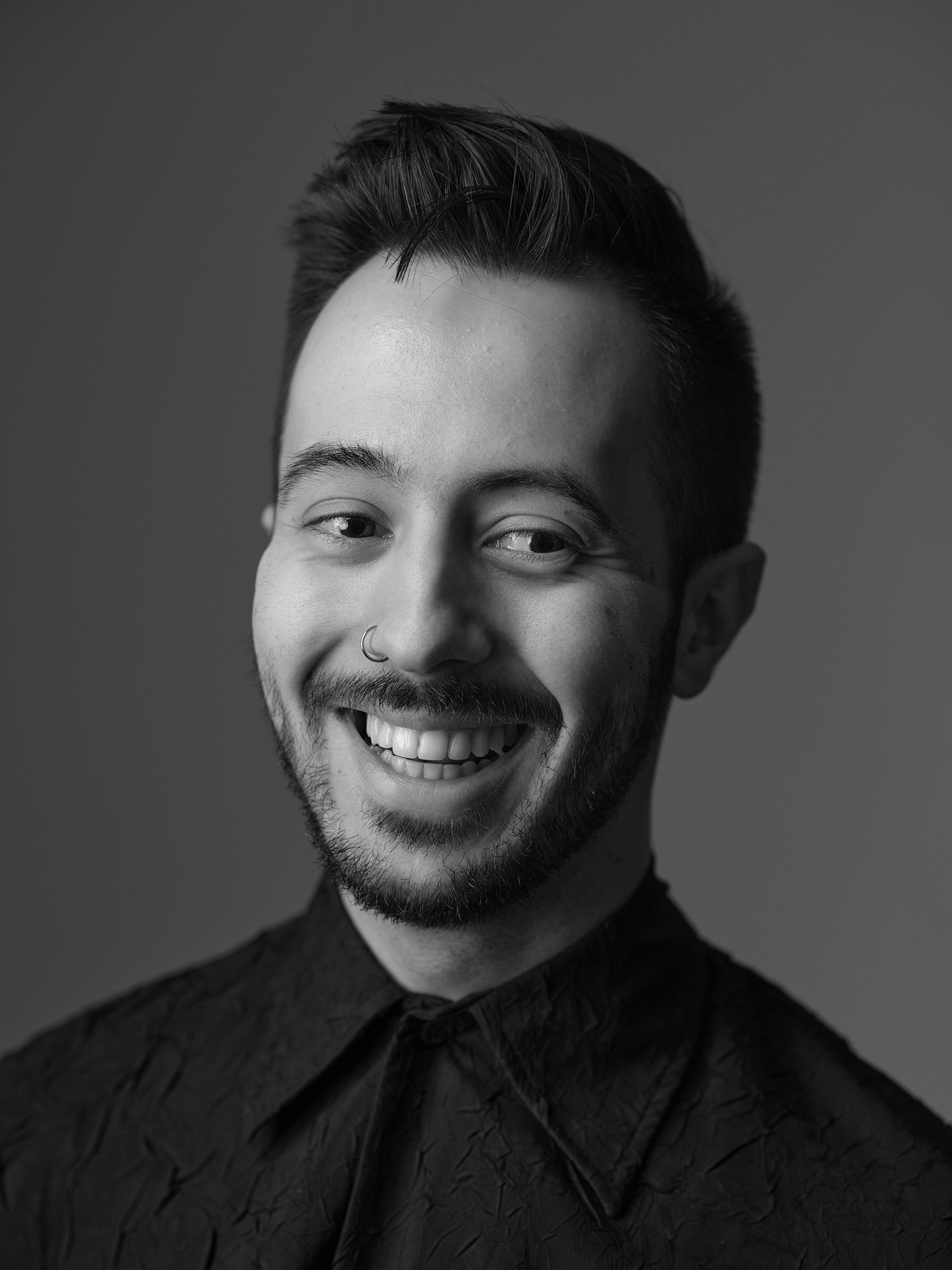 Portrait of Jake Oliveira Studio, internationally acclaimed Toronto-based industrial designer and co-founder of Ourse, specializing in contemporary furniture and product design.