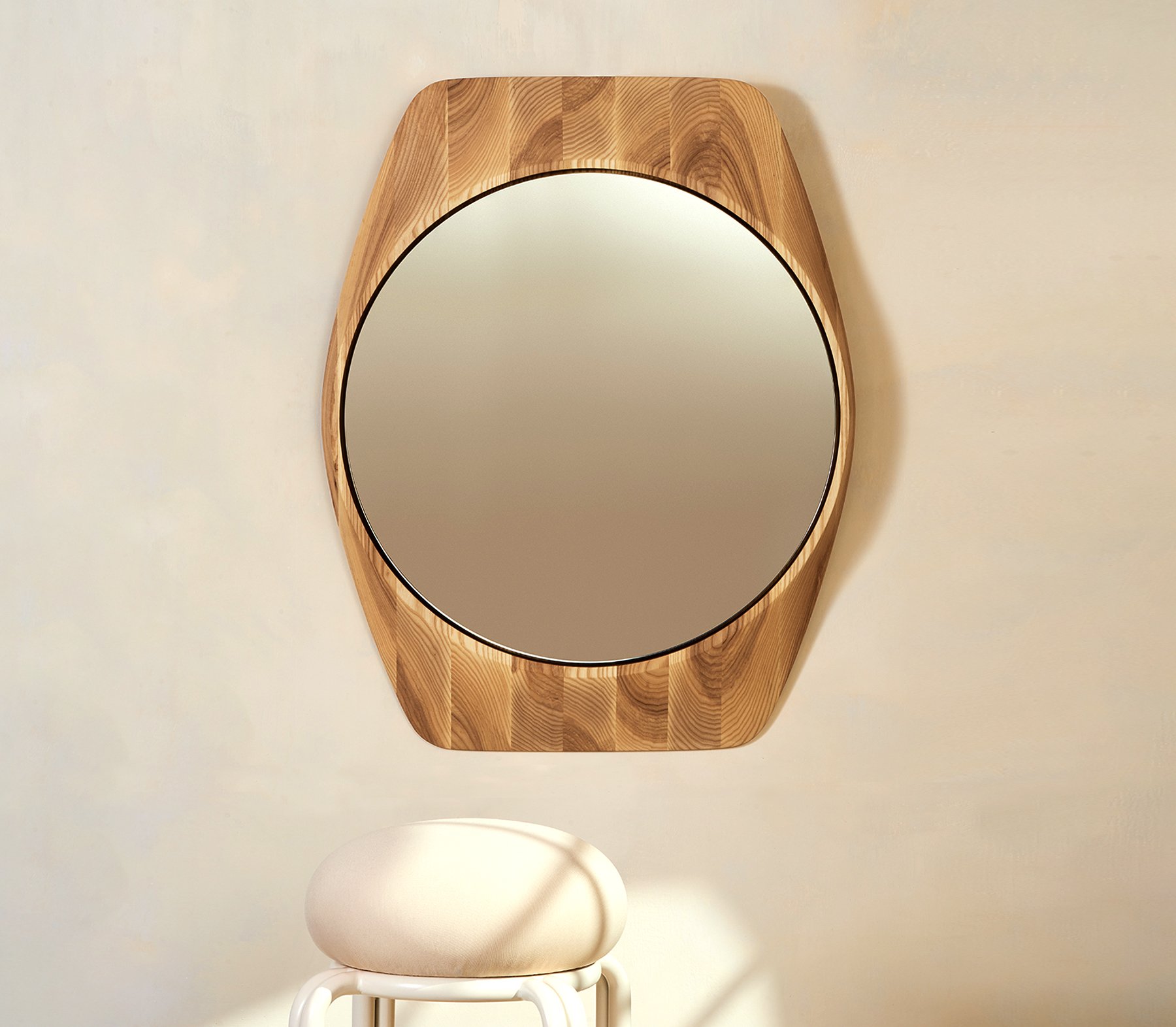 Tortue Mirror designed and made in Canada, featuring soft curved geometry inspired by contemporary watch forms and handcrafted local fabrication.