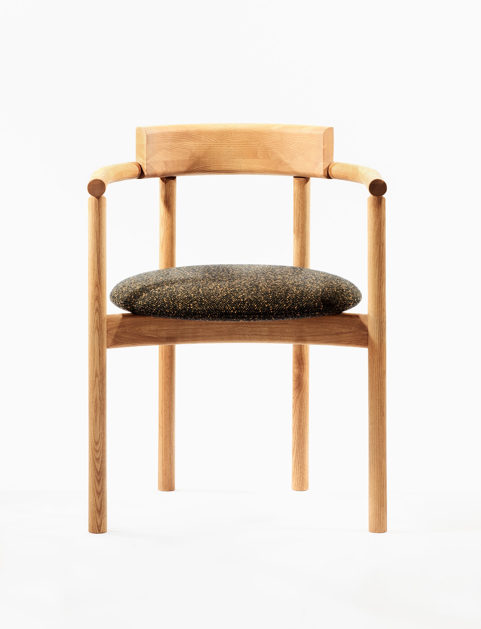 Abbey Dining Chair featuring a refined solid wood frame and upholstered seat, shown as part of the Ourse product collection.