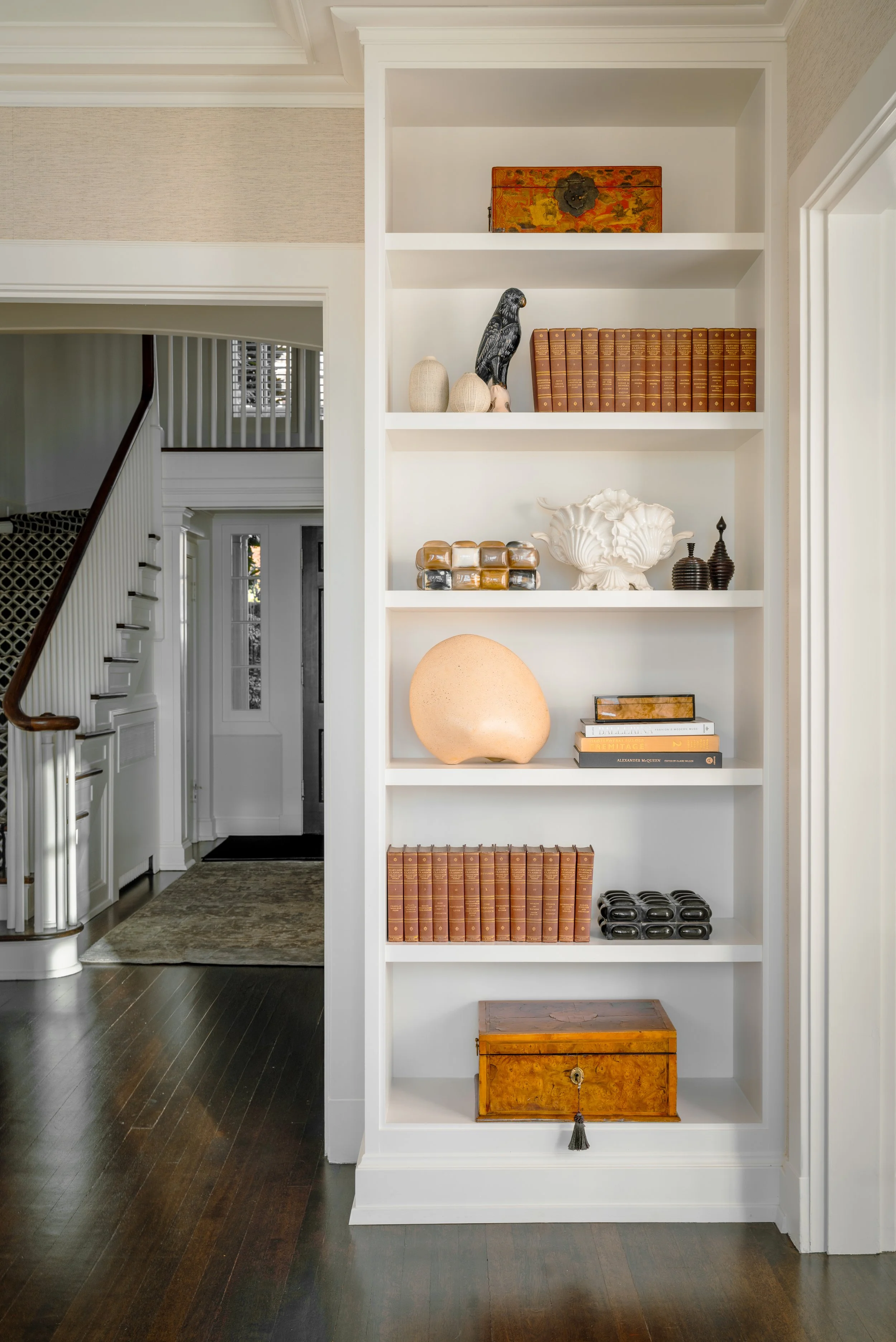 Styled bookshelves in a remodeled Seattle, WA music room on Lake Washington.