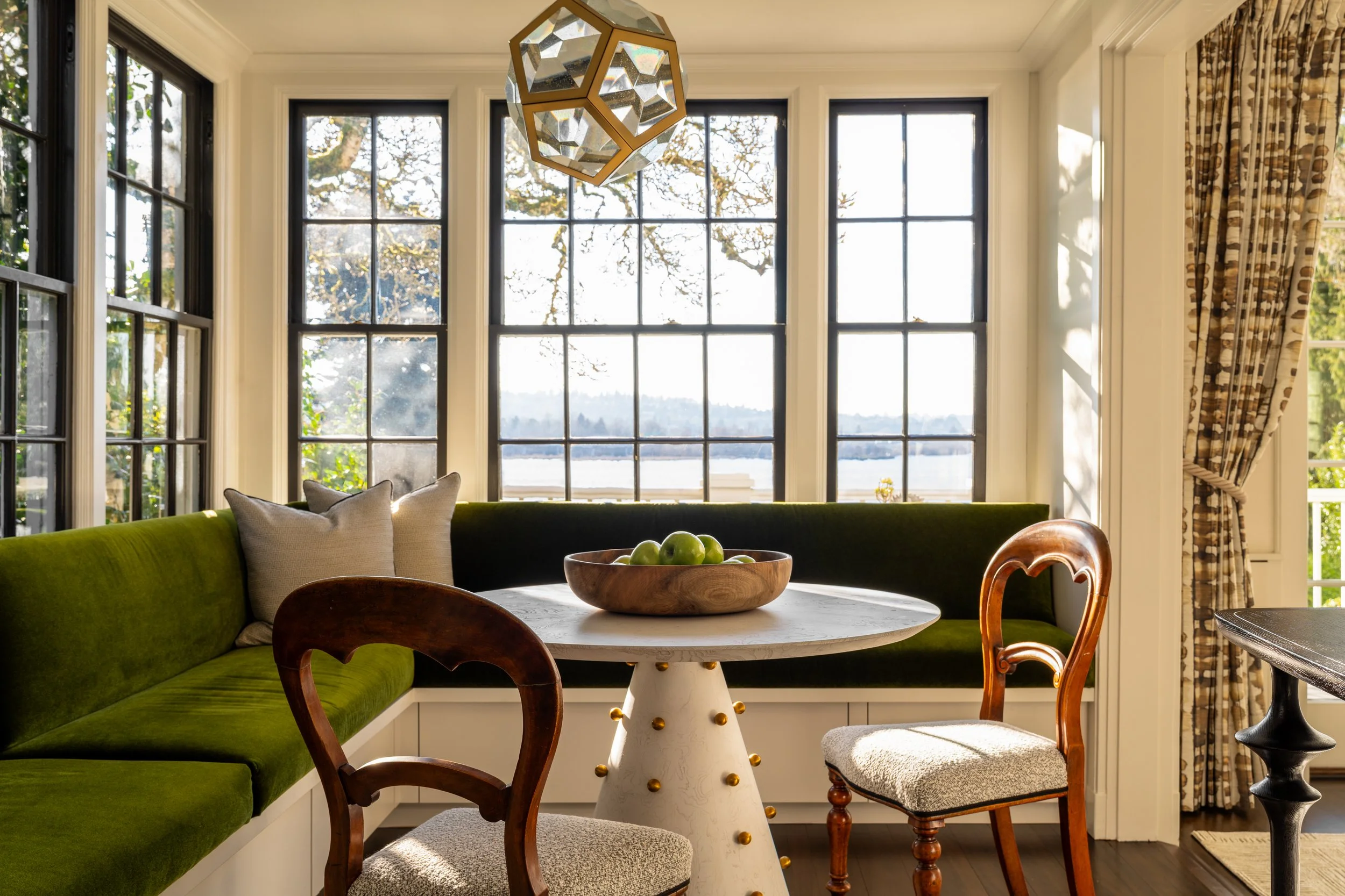 Kitchen Remodel with Banquette and Dining Table with two chairs