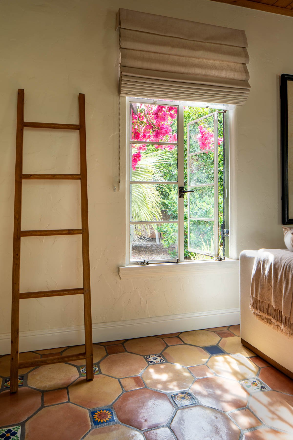Palm Springs, CA | Living Room Remodel | Terracotta Tile Floor and ladder next to open window