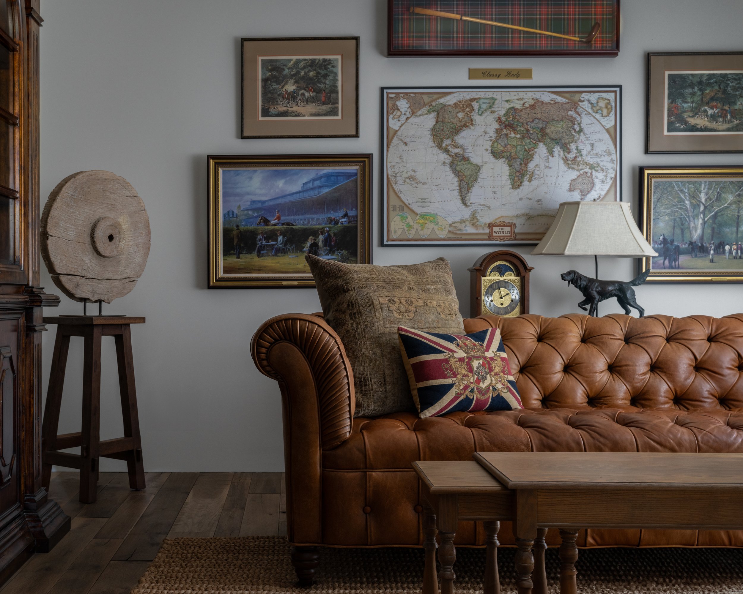 Texas Hill Country | Family Room Design | Chesterfield sofa and gallery wall