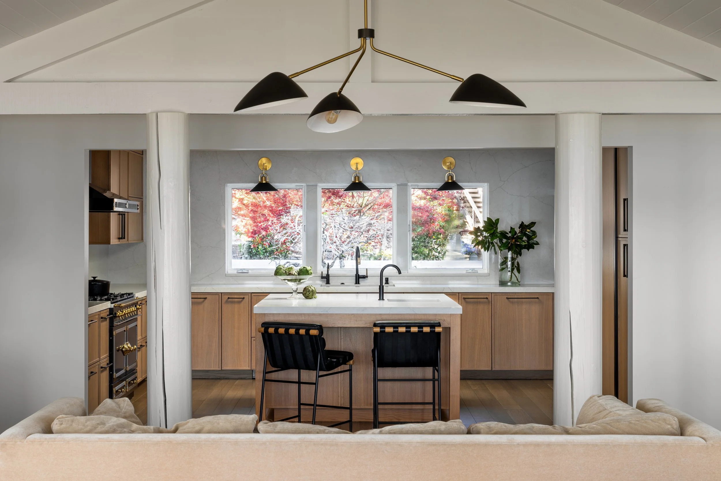 Gig Harbor Kitchen Remodel | View from living room to kitchen featuring and island