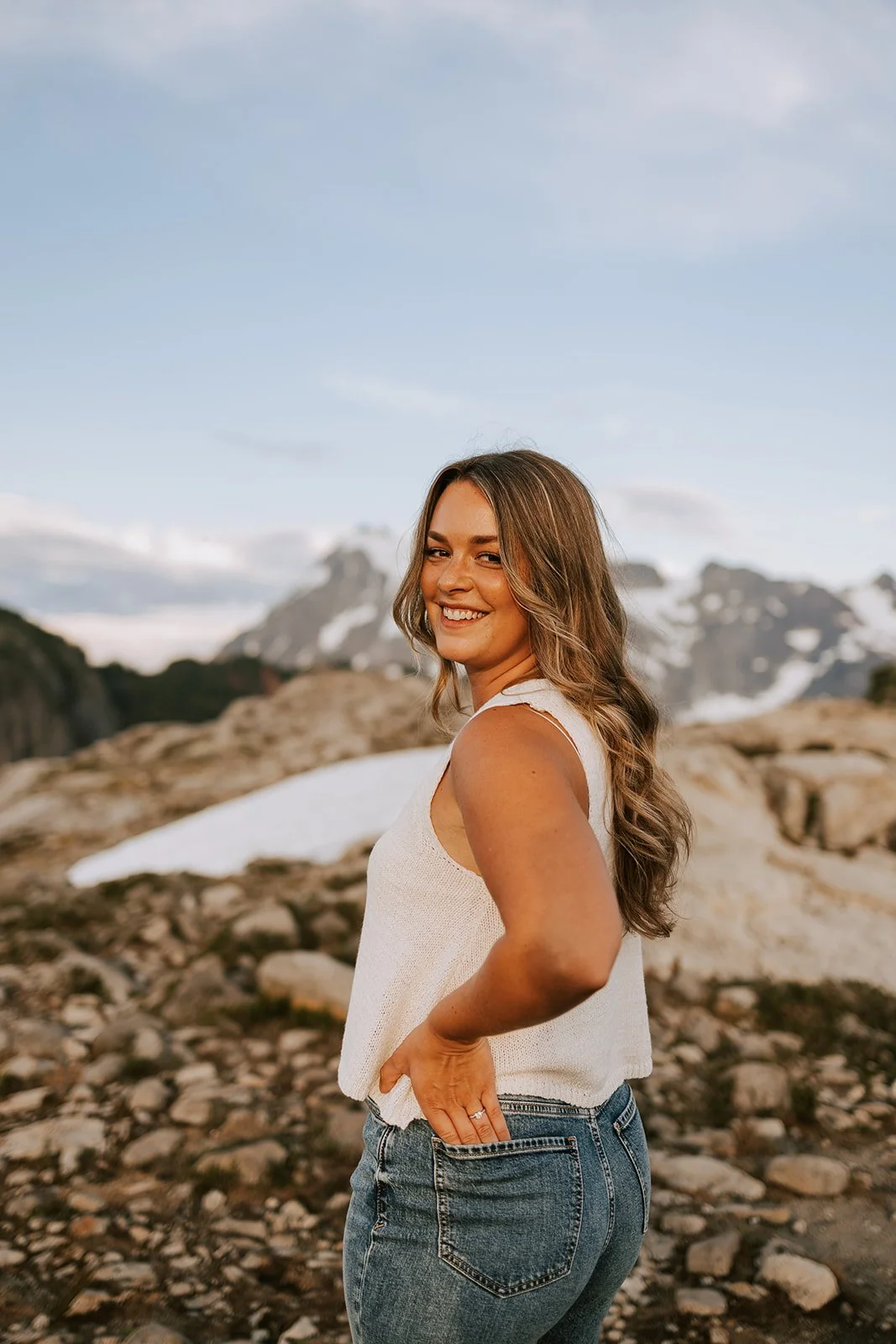 Bride with loose waves during a mountain elopement styled by Kaitlyn Coston