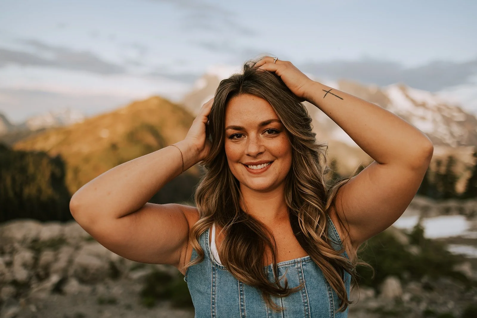 Kaitlyn Coston, blonde hair stylist in Lynden, Washington, with long soft waves