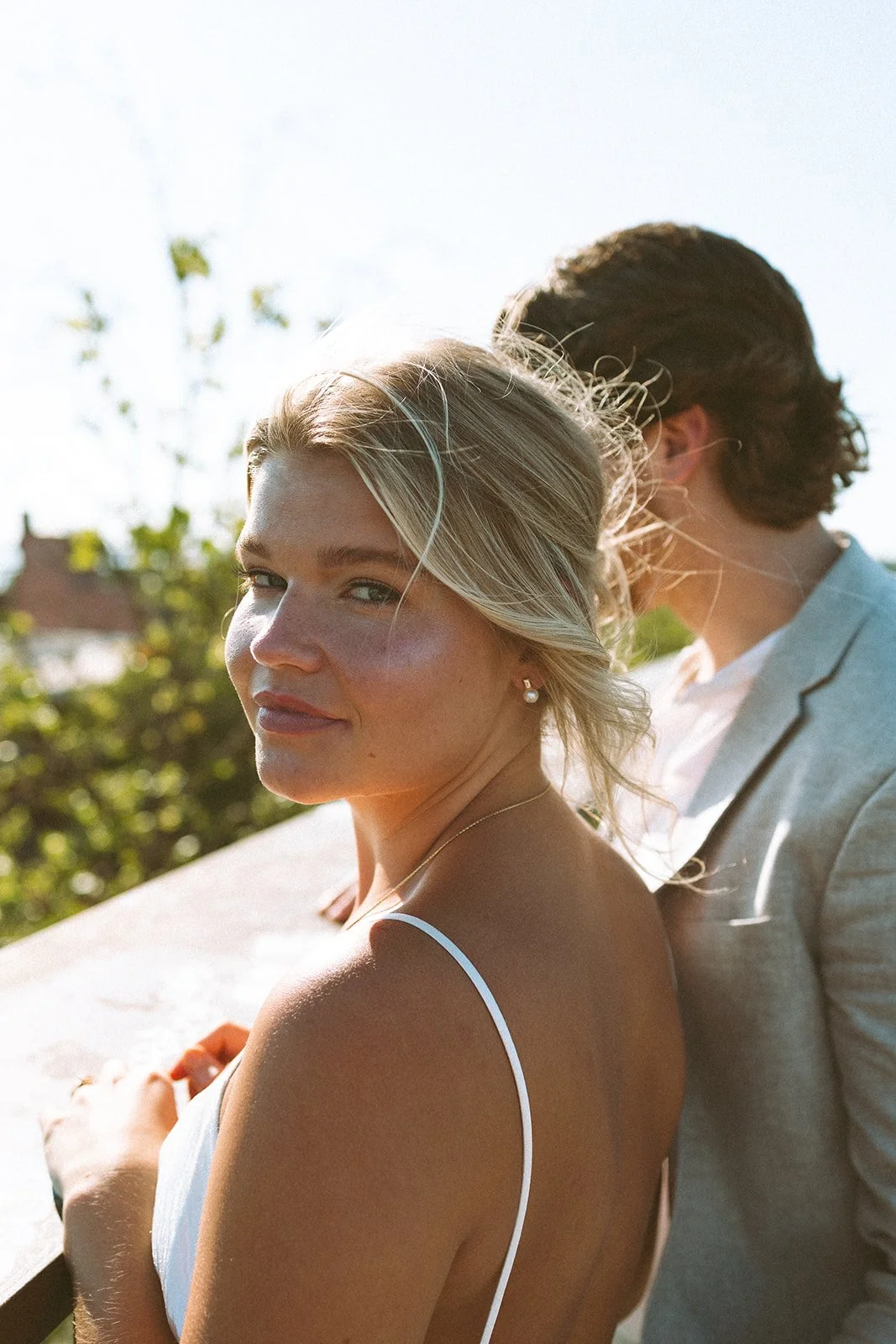Bride with natural elopement hair and makeup outdoors by Kaitlyn Coston