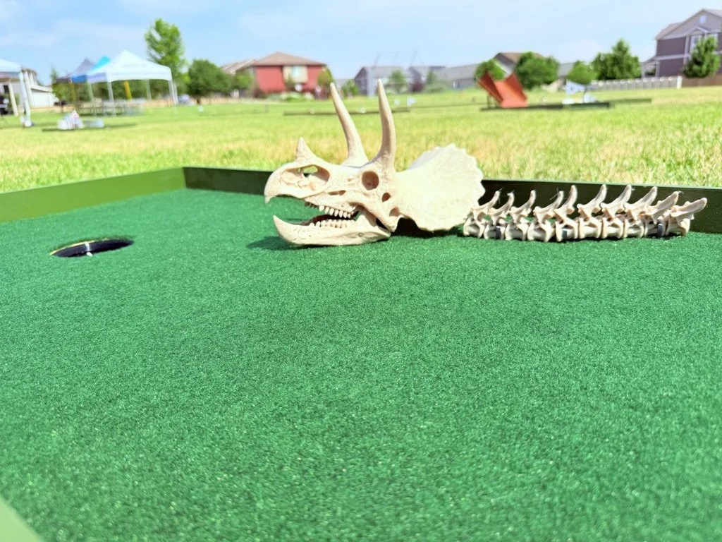 Dino themed portable mini golf putt putt rental for events