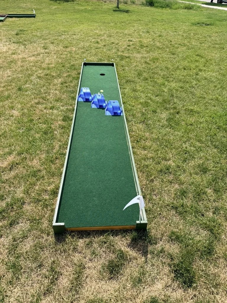 Triple loop themed portable mini golf putt putt rental for events