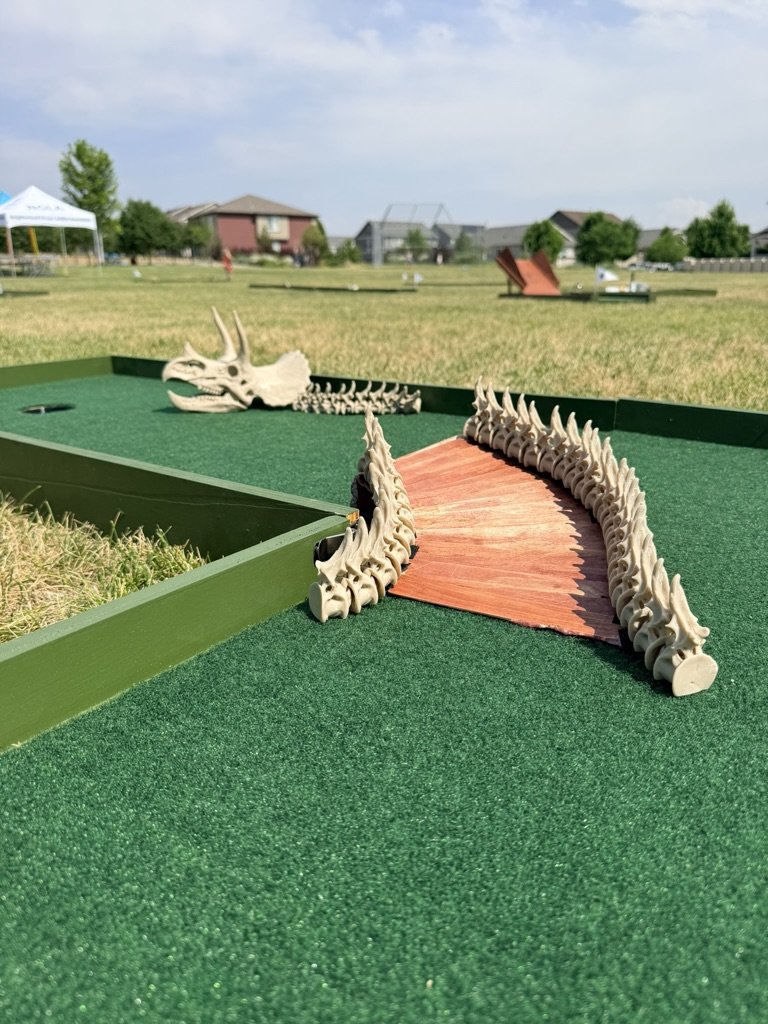 Dino themed portable mini golf putt putt rental for events