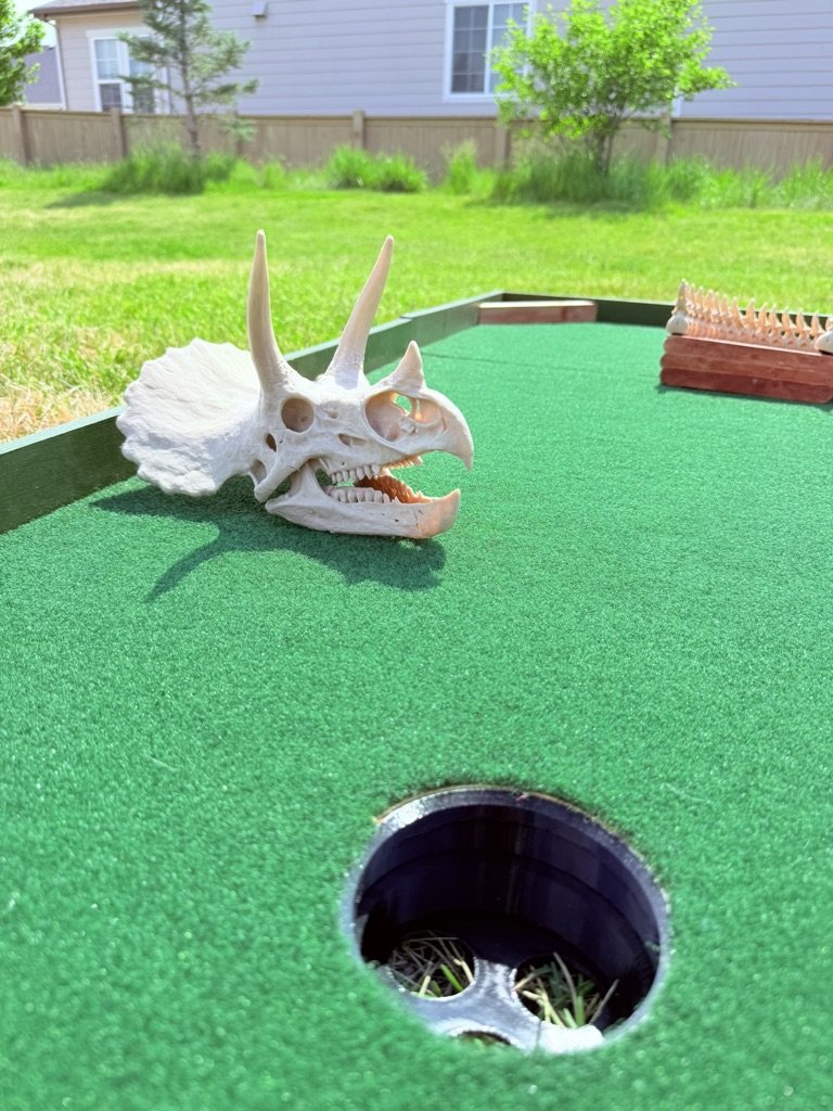 Dino themed portable mini golf putt putt rental for events