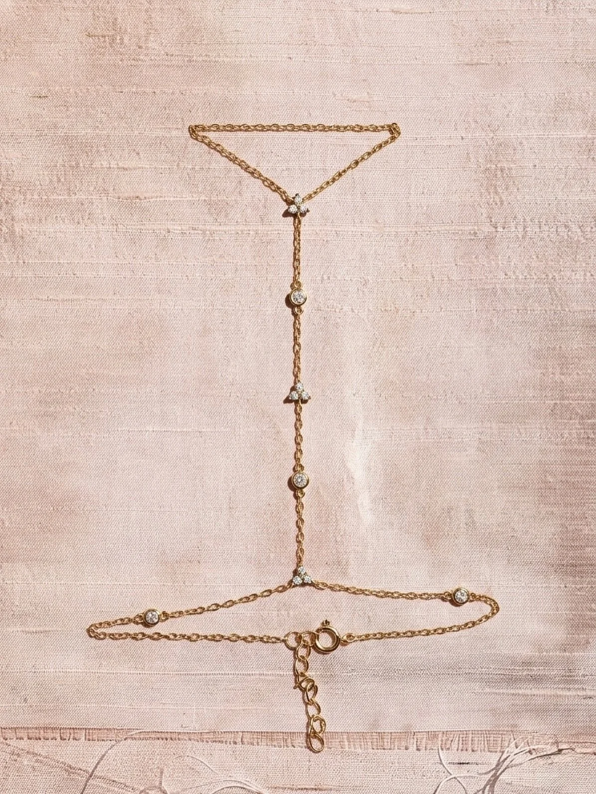 BESTSELLER: The Signature Zirconia Handchain. 925 sterling silver and 18K gold plated with zirconia detailing. Designed for the petite hands. 
Available now. Limited pieces left. 

#jewelry #handchains #gold #brand