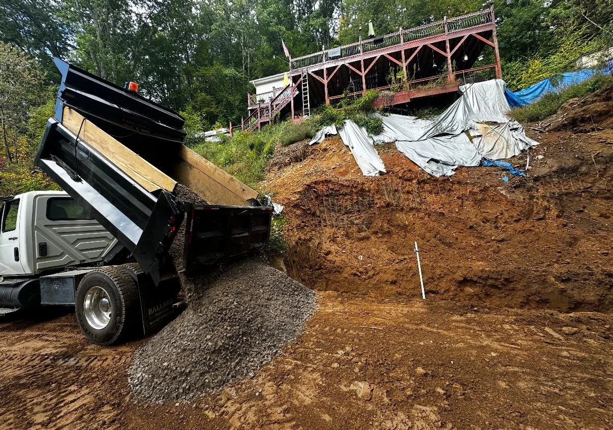 Material hauling services completed in Leicester, North Carolina.