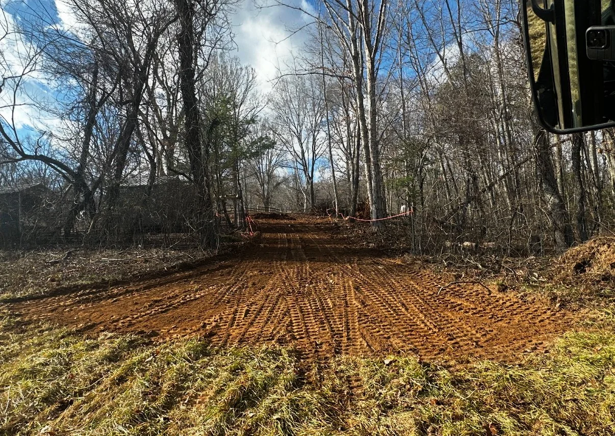 Forestry mulching completed on a wooded property in Waynesville, North Carolina.