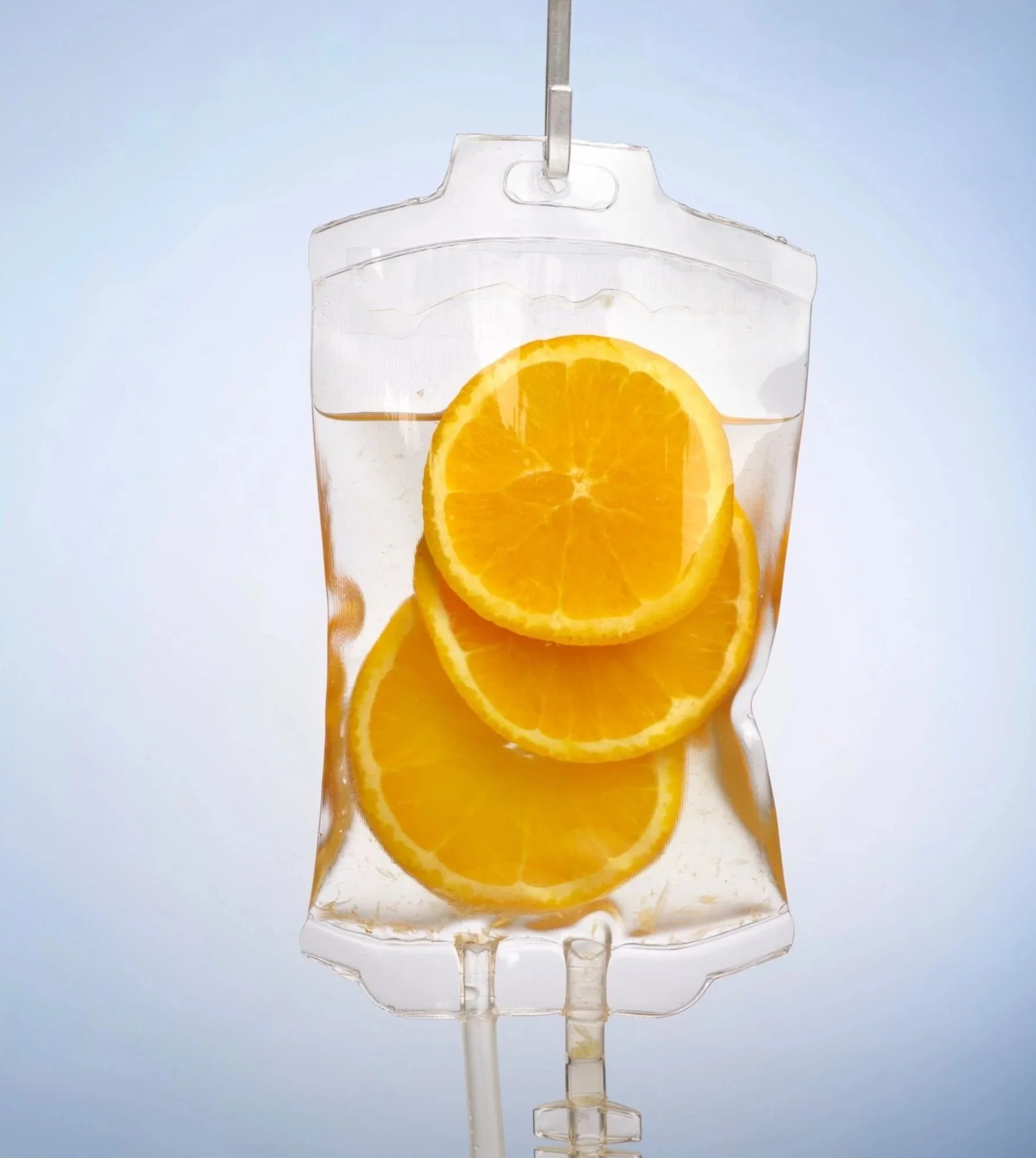 Vitamin Infusion Bag with slices if oranges.
