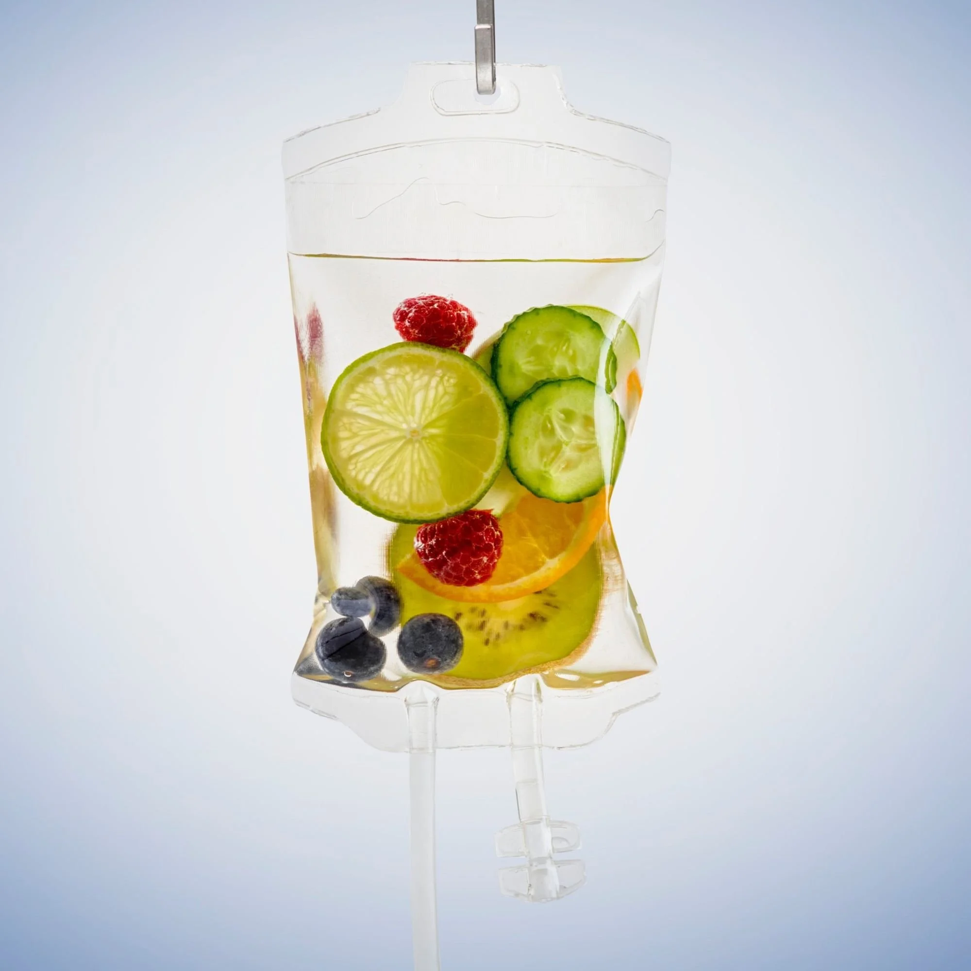 Infusion bag filled with slices of fruit and berries.