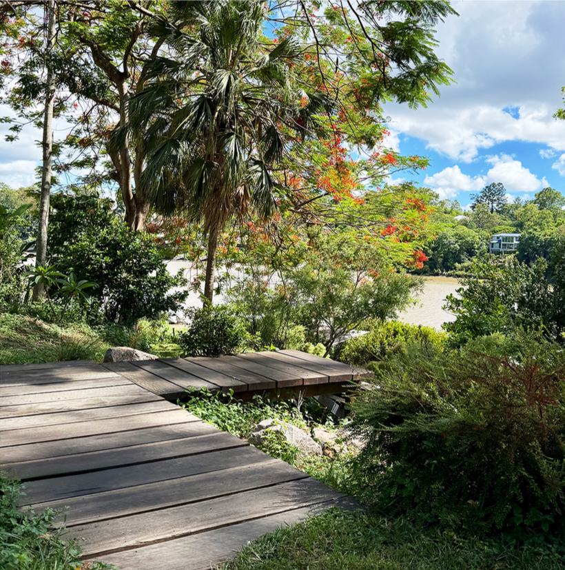 Custom built steel and hardwood walkway and staircase following the natural slope of the property in Brisbane, Queensland 