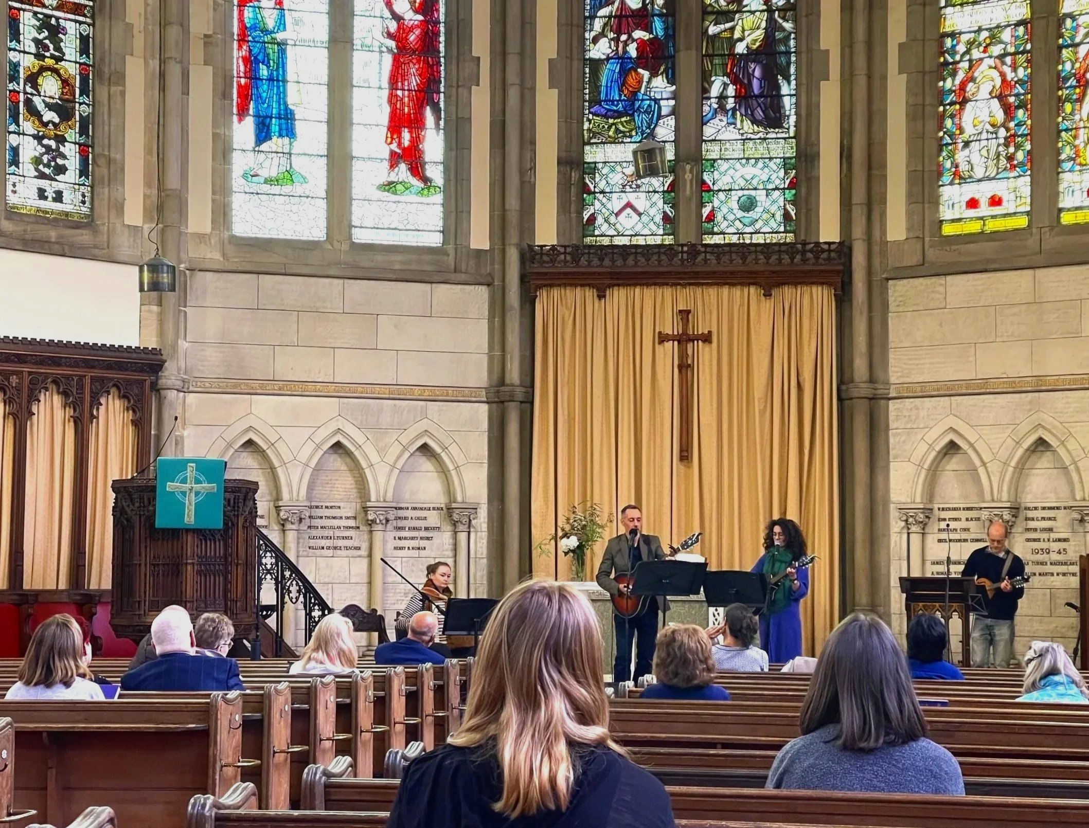 The Stained Glass Hymns worship band leads worship during a Sunday service at Kelvinside Hillhead Parish Church.