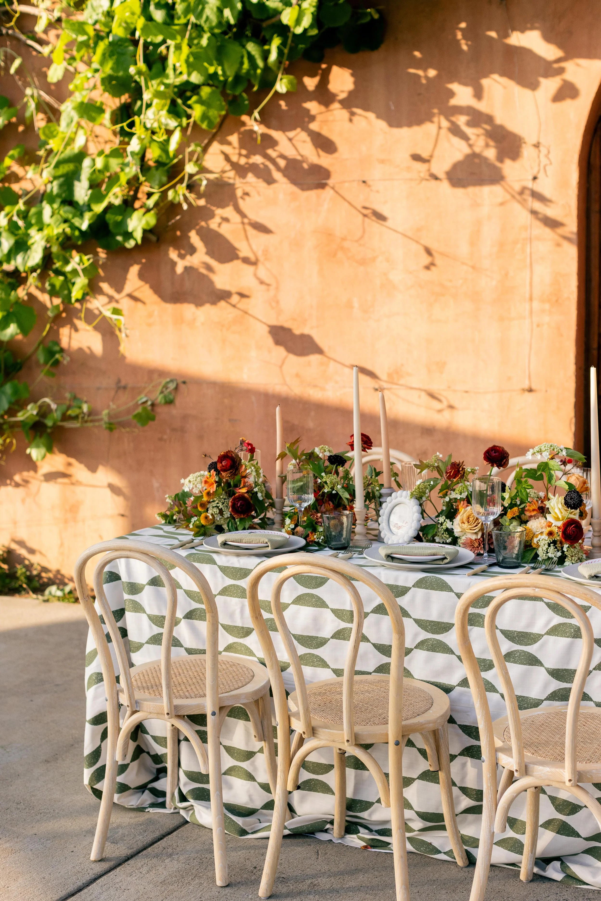 wedding detail flat lay with patterned textures and styling elements