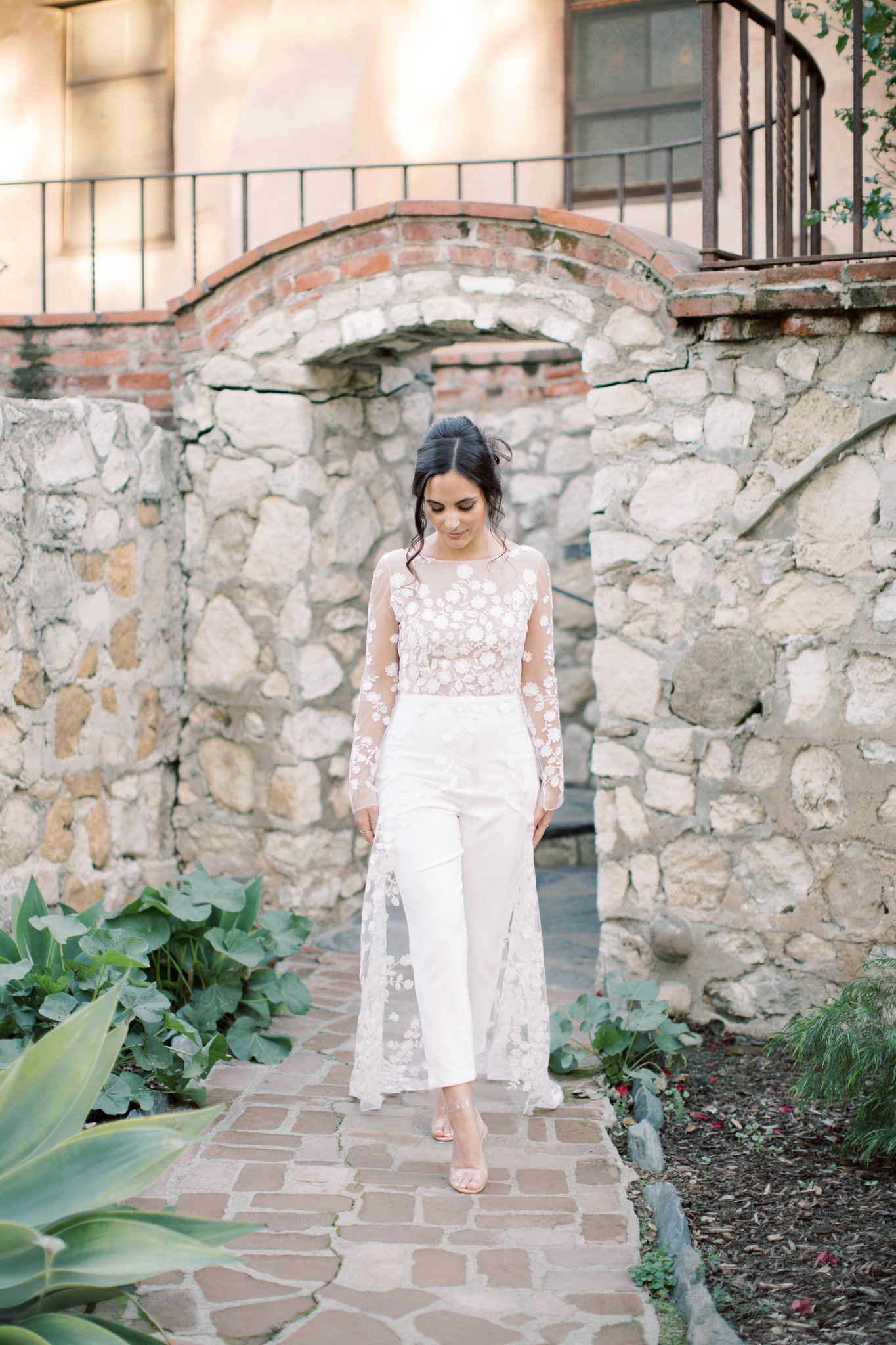 bride portrait in architectural setting with elegant wedding style