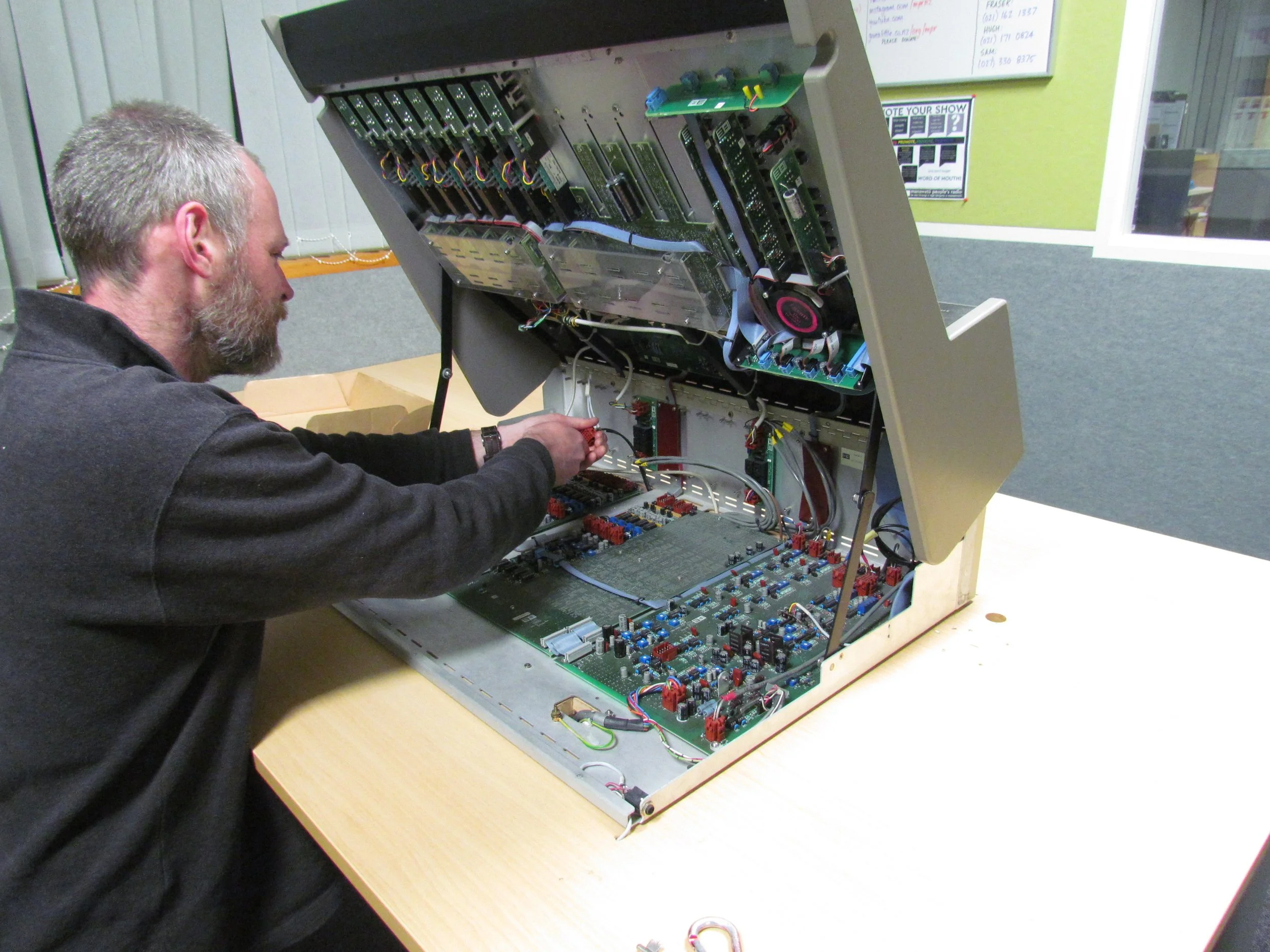 Kaiwhakahaere Fraser Greig dismantles the On Air desk ready for our studio upgrades in 2018.