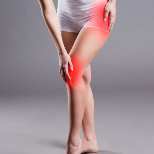 A woman touching her knee and thigh, with red highlights indicating pain or discomfort.