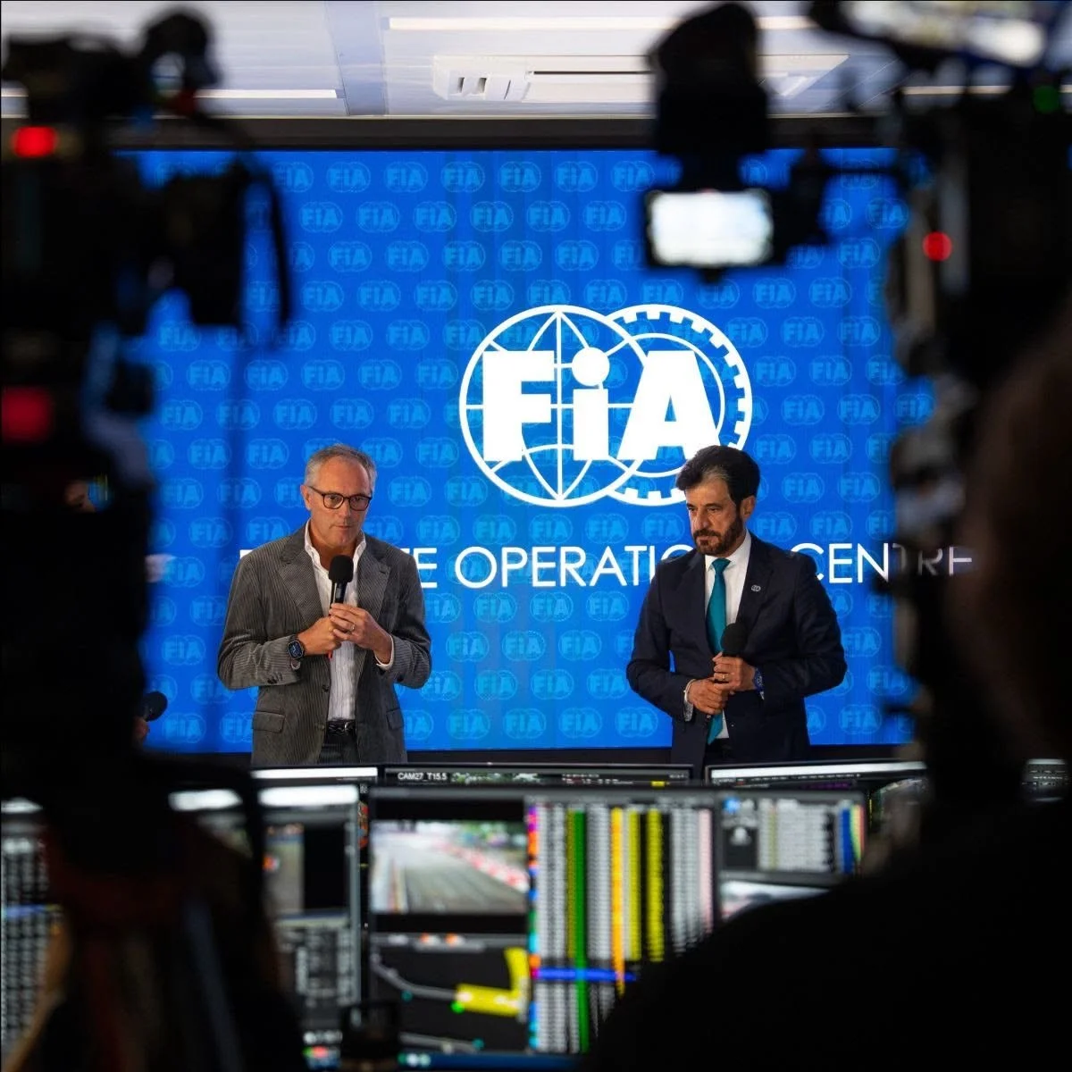 Stefano Domenicali and Mohammed Ben Sulayem speak at the opening of the FIA Remote Operations Centre at Biggin Hill