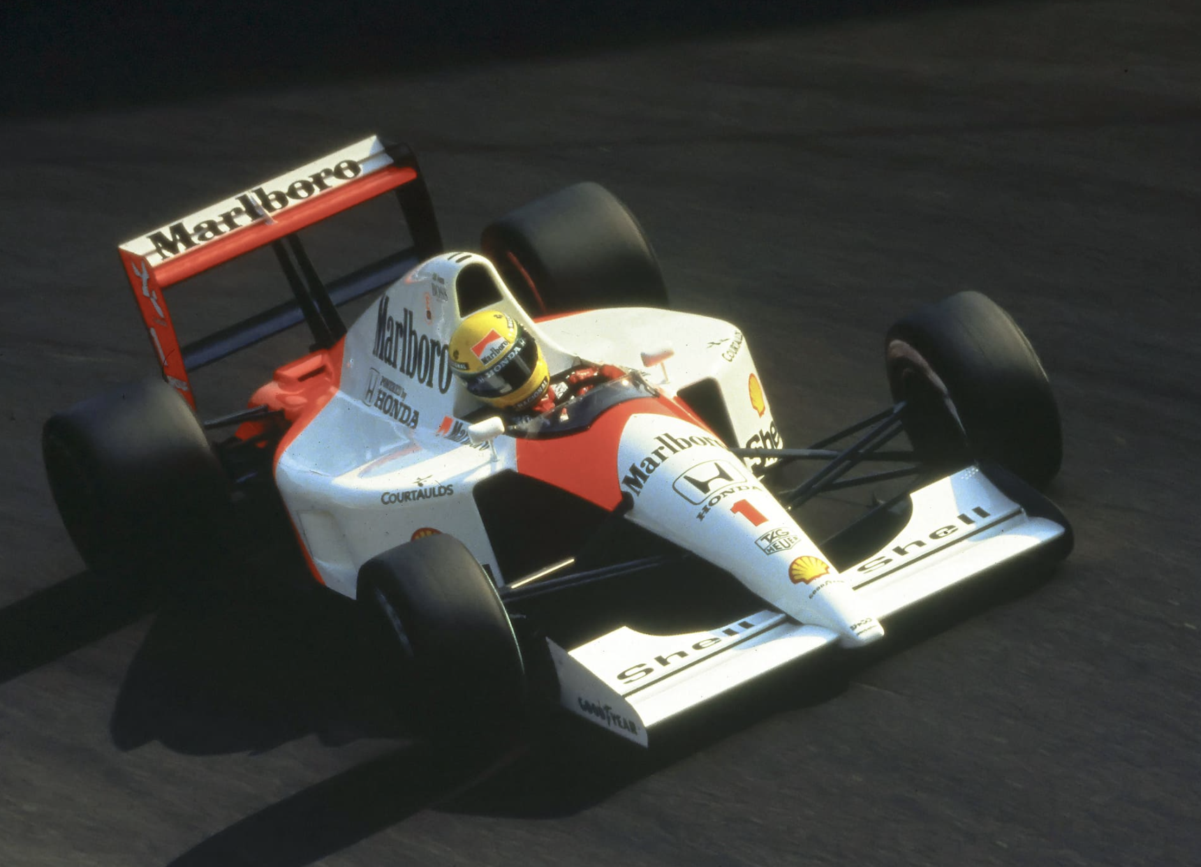 Ayrton Senna during his Formula 1 career, remembered on the anniversary of his death and lasting legacy in motorsport history.