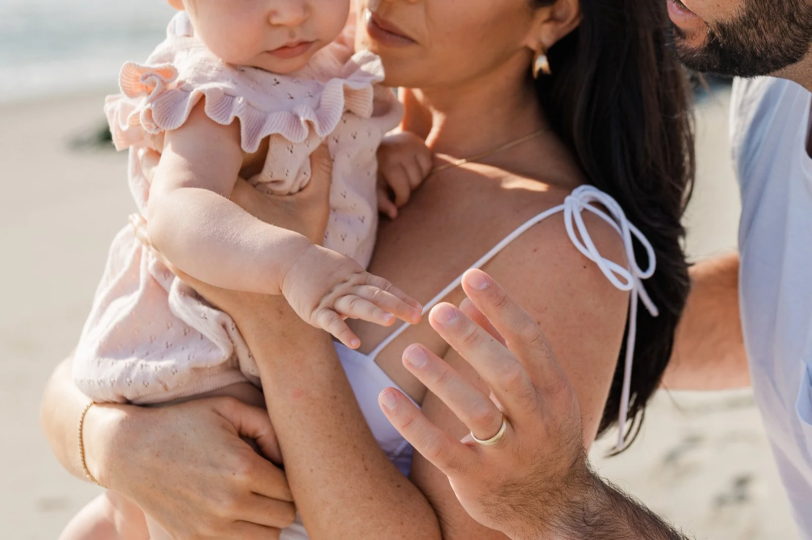 A family at the beach. Family photography.
